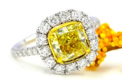 GIA Natural Fancy Yellow Diamond 3.22 CTW 18K White Gold Halo Engagement Ring