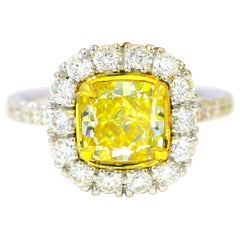 GIA Natural Fancy Yellow Diamond 3.22 CTW 18K White Gold Halo Engagement Ring