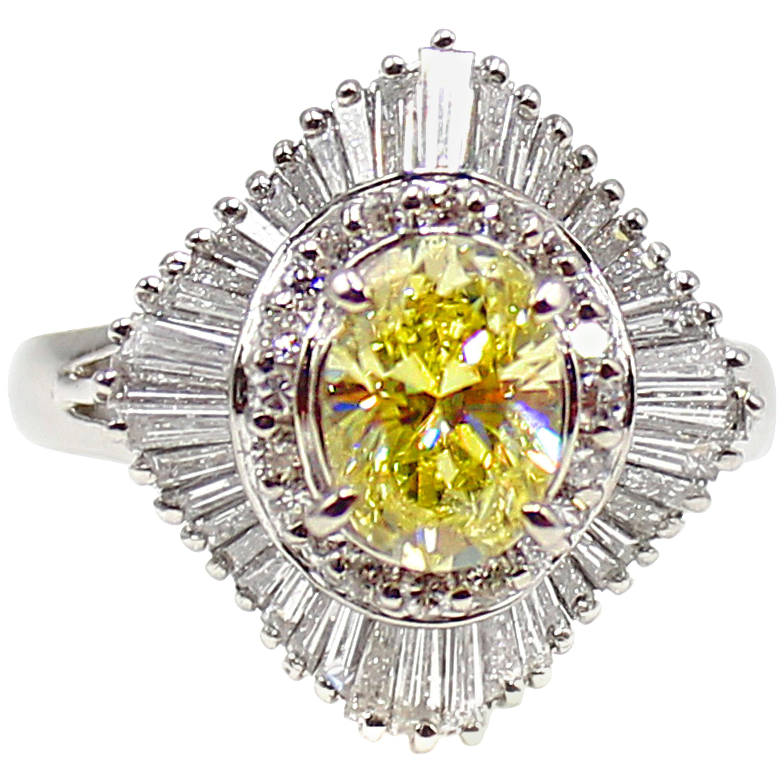 GIA Natural Fancy Yellow Oval Diamond Ballerina Ring For Sale