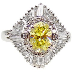 GIA Natural Fancy Yellow Oval Diamond Ballerina Ring