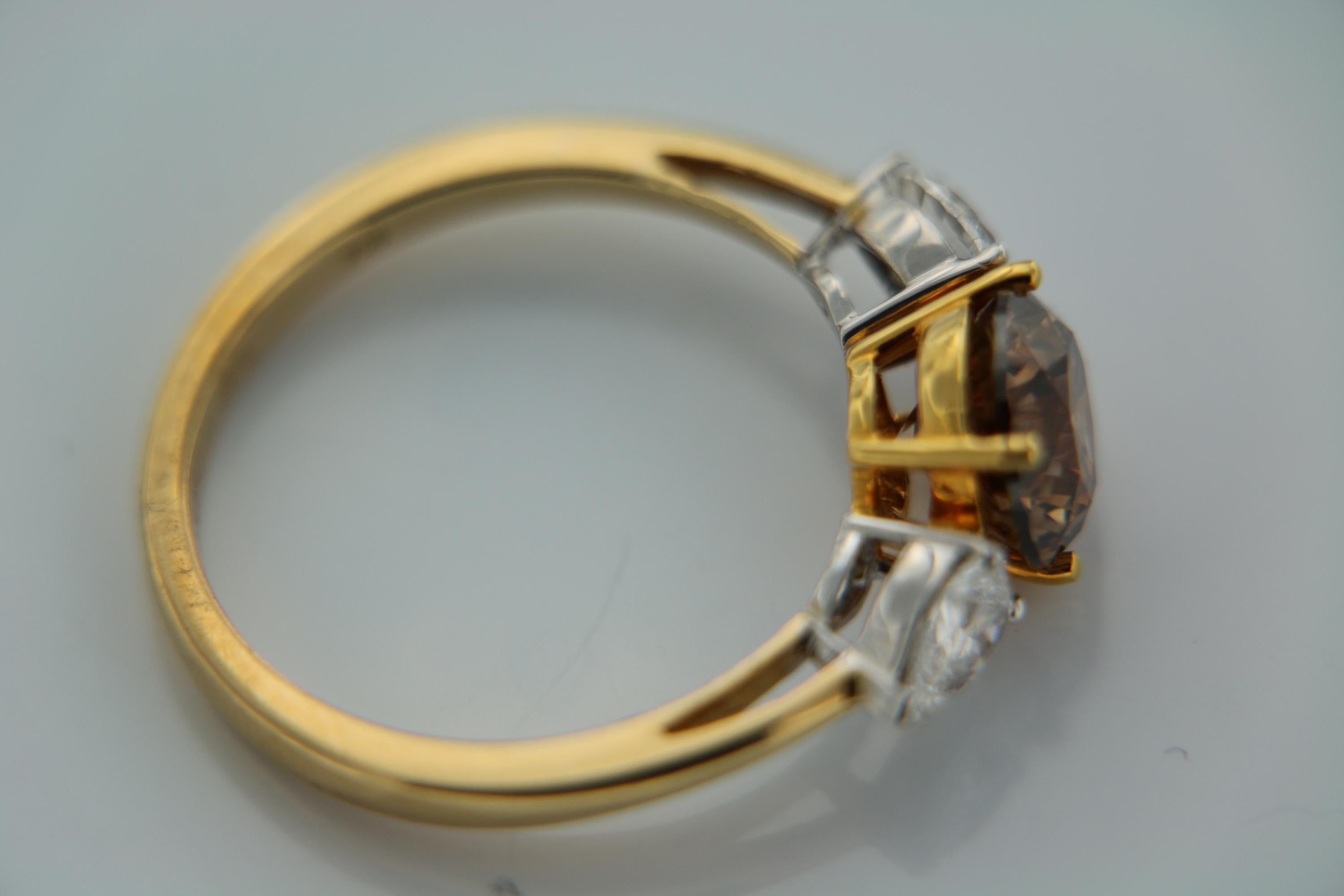 GIA Natural Fancy Yellowish Brown Round Brilliant And Pear Diamond Ring In 18 K  For Sale 1