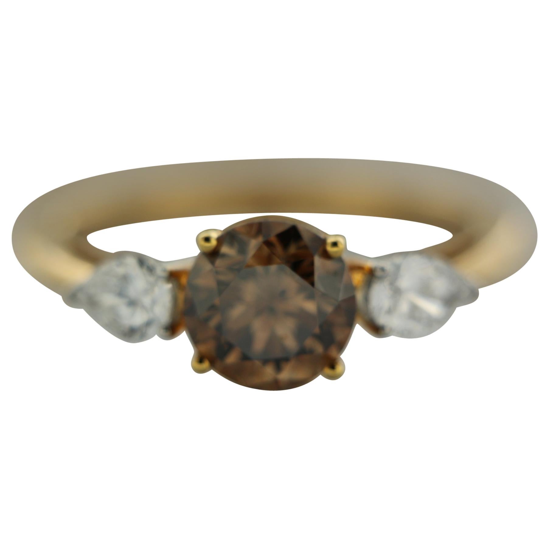GIA Natural Fancy Yellowish Brown Round Brilliant And Pear Diamond Ring In 18 K  For Sale