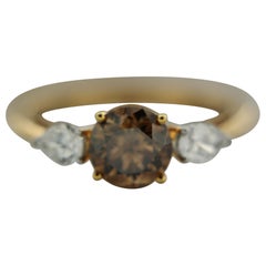 Used GIA Natural Fancy Yellowish Brown Round Brilliant And Pear Diamond Ring In 18 K 