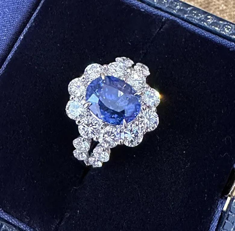 GIA Natural No Heat Burma Sapphire 3.53 Carat in Diamond Platinum Ring

Sapphire and Diamond Ring features a 3.53 Carat Oval shaped Natural Sapphire surrounded by Round Brilliant Diamonds in a Platinum Halo setting.

The Sapphire originates from