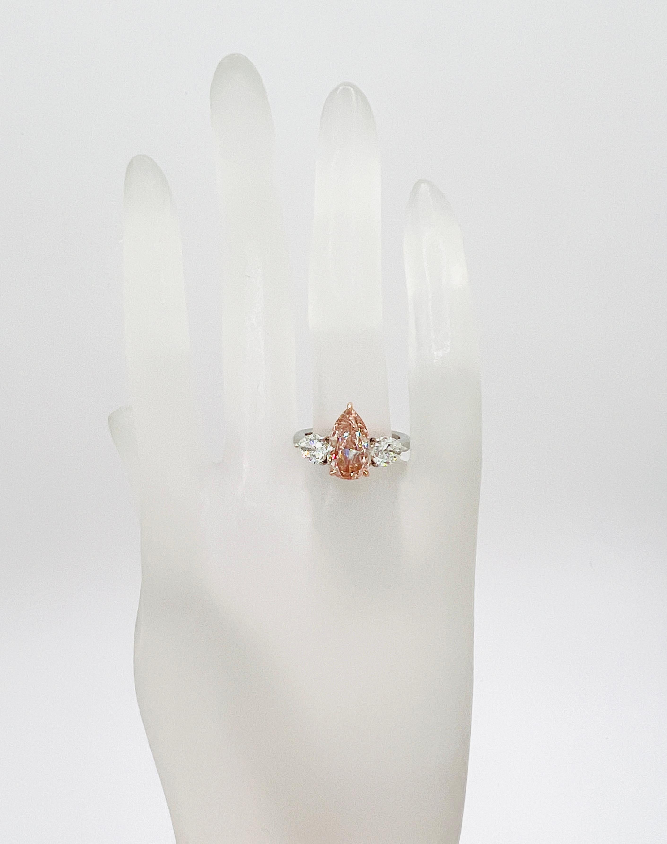 Pear Cut GIA Natural Pink and White Diamond Three Stone Ring in Platinum & 18K Rose Gold For Sale