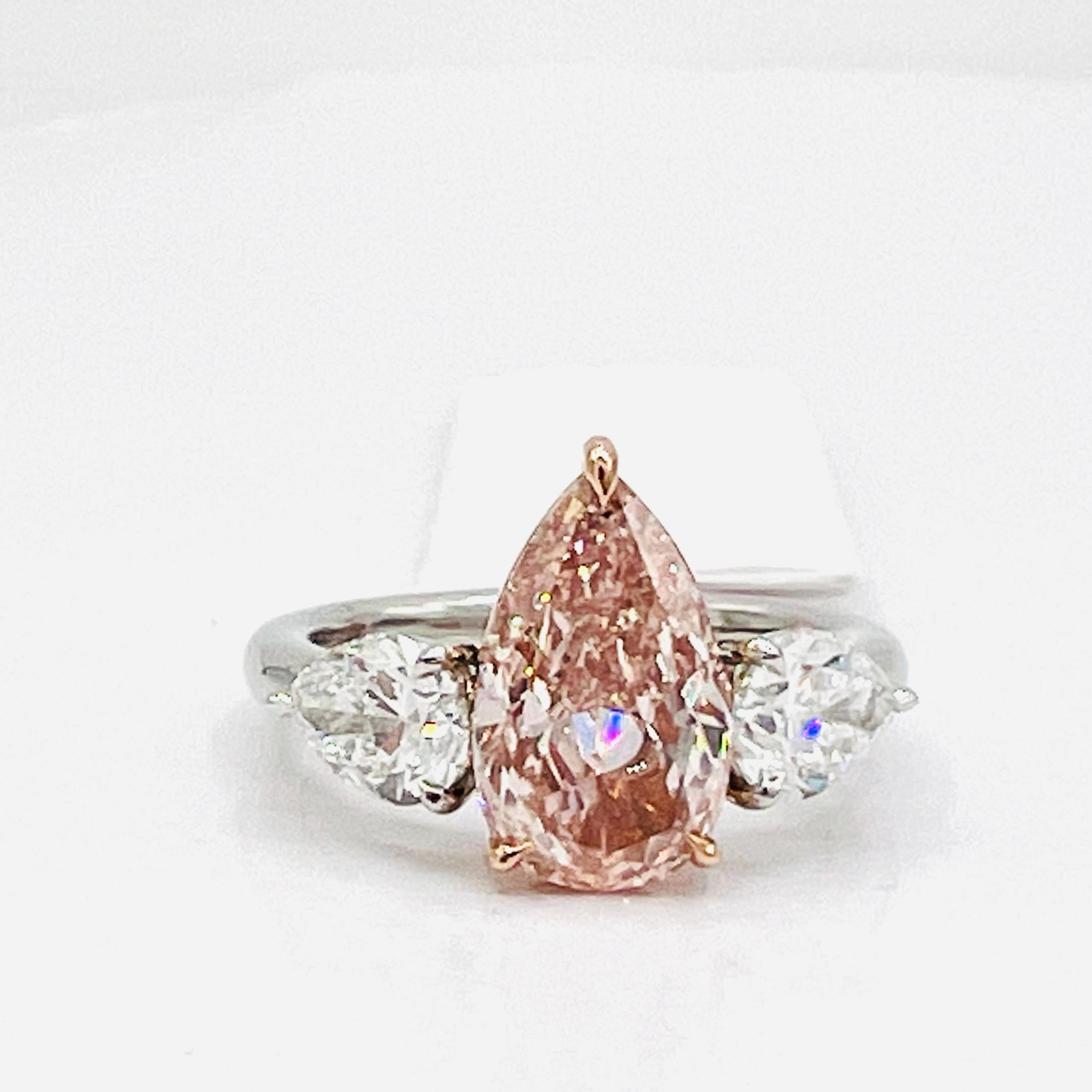 GIA Natural Pink and White Diamond Three Stone Ring in Platinum & 18K Rose Gold In New Condition For Sale In Los Angeles, CA