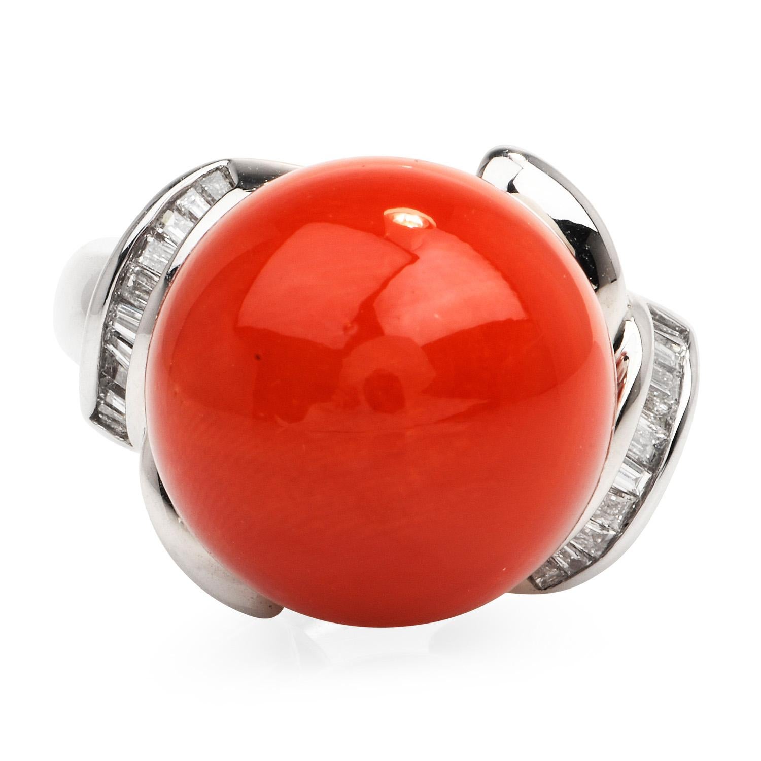 Natural Red Bead coral cocktail ring crafted in solid Platinum, the center is adorned by a GIA certified Natural Non-dyed Red Coral, round cabochon shaped, half bezel set measures 14 mm

As a touch of sparkle, there are (20) tapered baguette-cut,