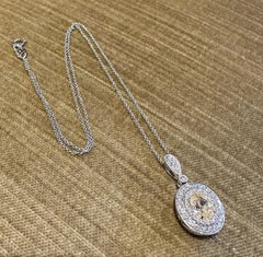 GIA Natural Yellow 1.50 carat Oval Diamond Pendant Necklace in White Gold