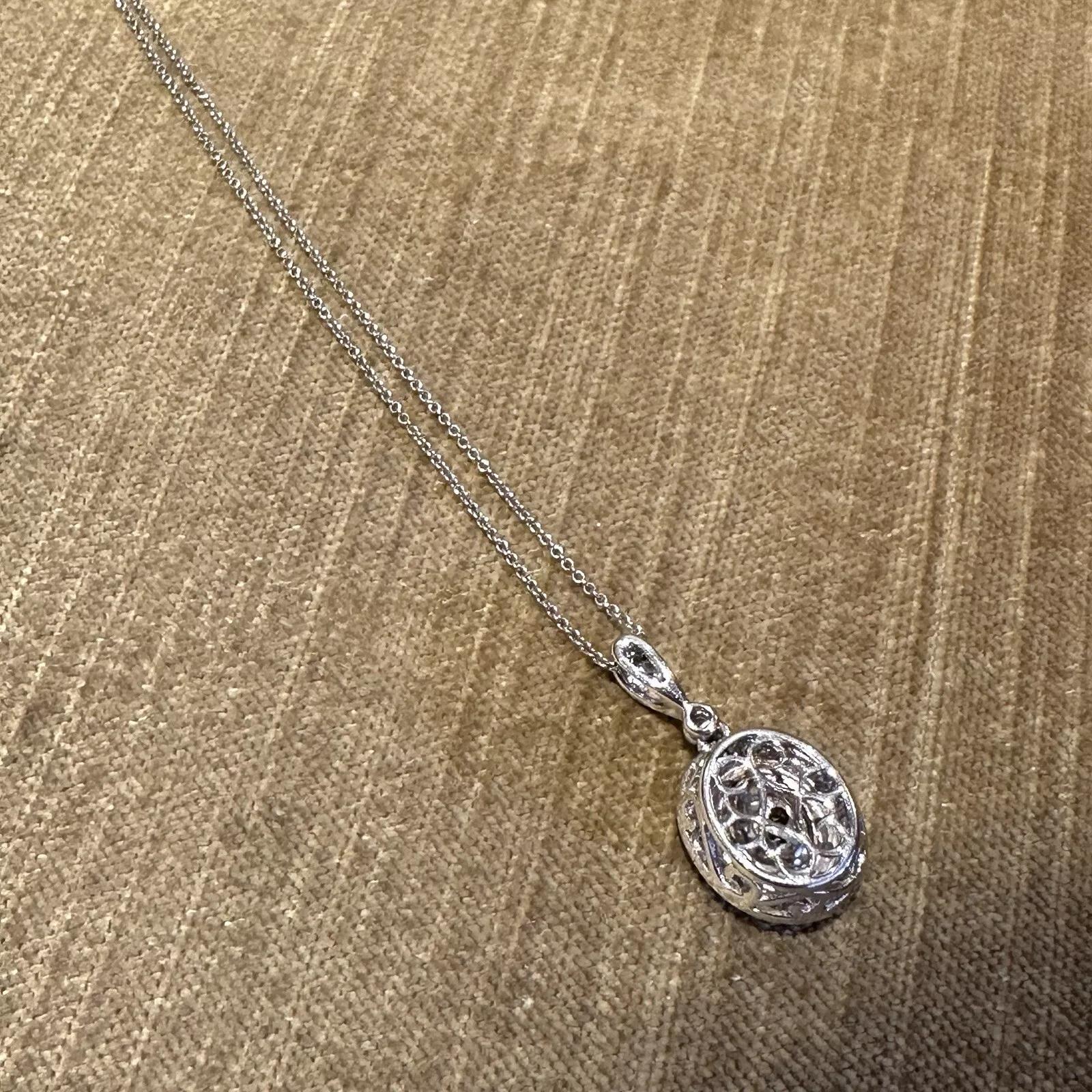 GIA Natural Yellow 1.50 carat Oval Diamond Pendant Necklace in White Gold For Sale 1