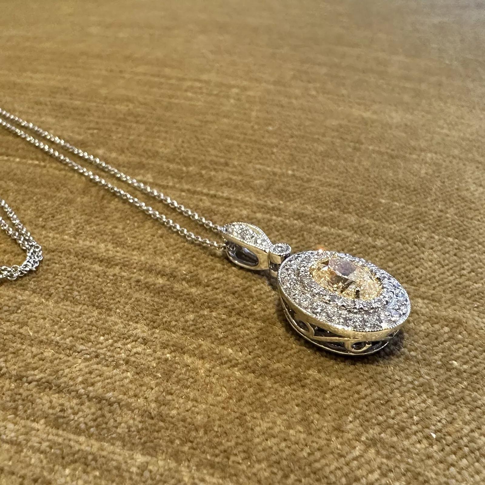 GIA Natural Yellow 1.50 carat Oval Diamond Pendant Necklace in White Gold For Sale 2