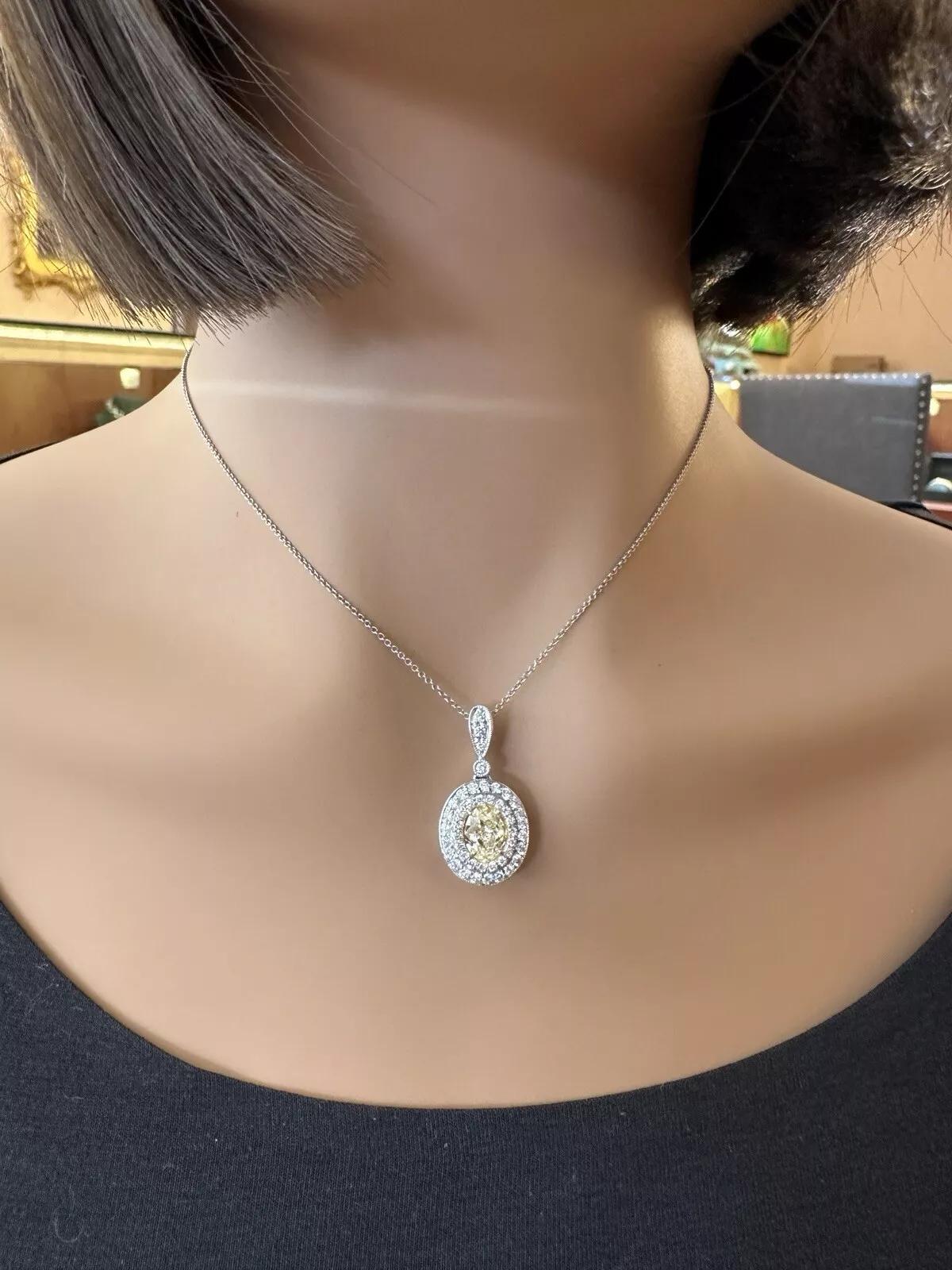 GIA Natural Yellow 1.50 carat Oval Diamond Pendant Necklace in White Gold For Sale 3
