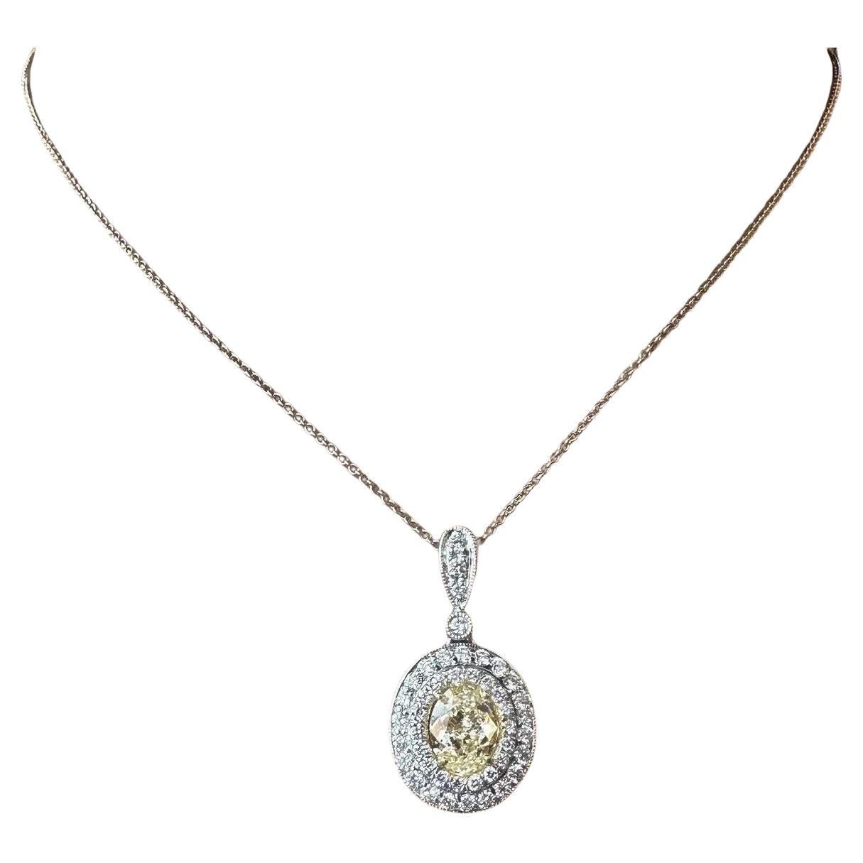 GIA Natural Yellow 1.50 carat Oval Diamond Pendant Necklace in White Gold For Sale