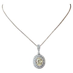 GIA Natural Yellow 1.50 carat Oval Diamond Pendant Necklace in White Gold