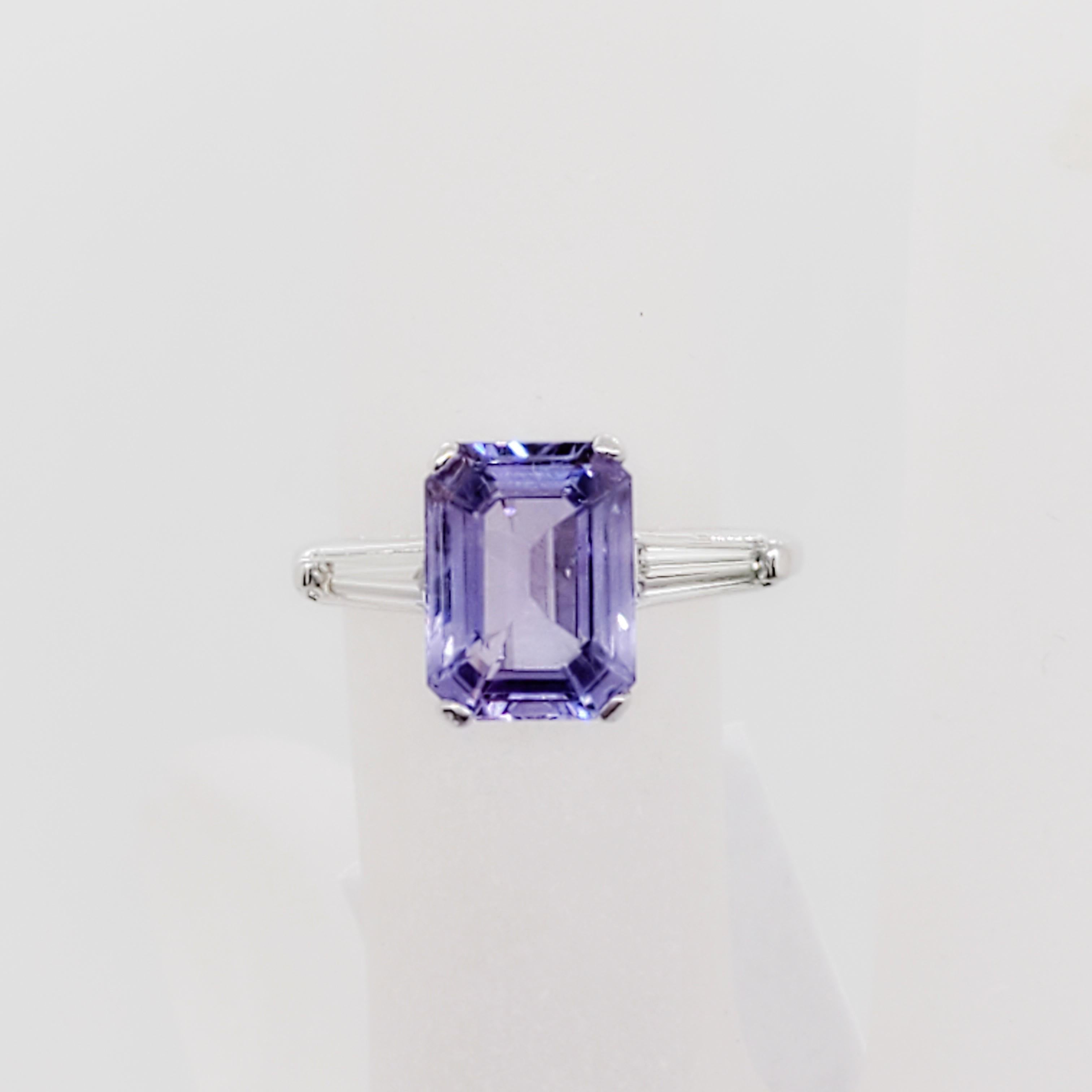 Absolutely gorgeous unheated 3.32 ct. Sri Lanka purple sapphire emerald cut with an excellent color and cut.  0.35 ct. of good quality, white, and bright diamond baguettes in a handmade 18k white gold mounting.  Ring size 4, can be resized. GIA