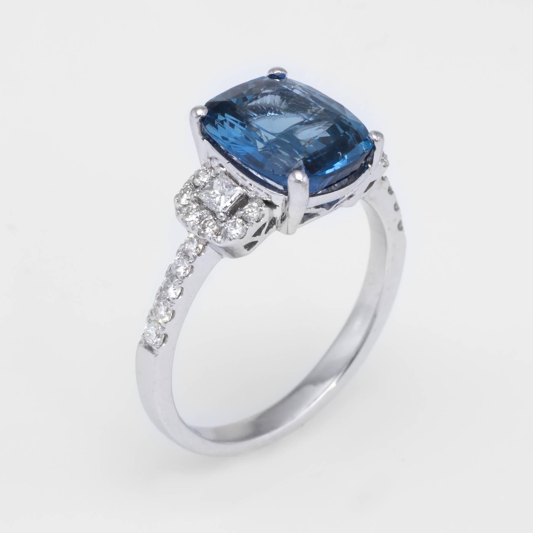 Overview:

Elegant estate ring, crafted in 18 karat white gold. 

Centrally mounted cushion cut natural blue sapphire measures 9.71 x 8.47 x 4.93mm. The sapphire weighs 3.67 carats. The transparent Madagascar sapphire is GIA certified (no