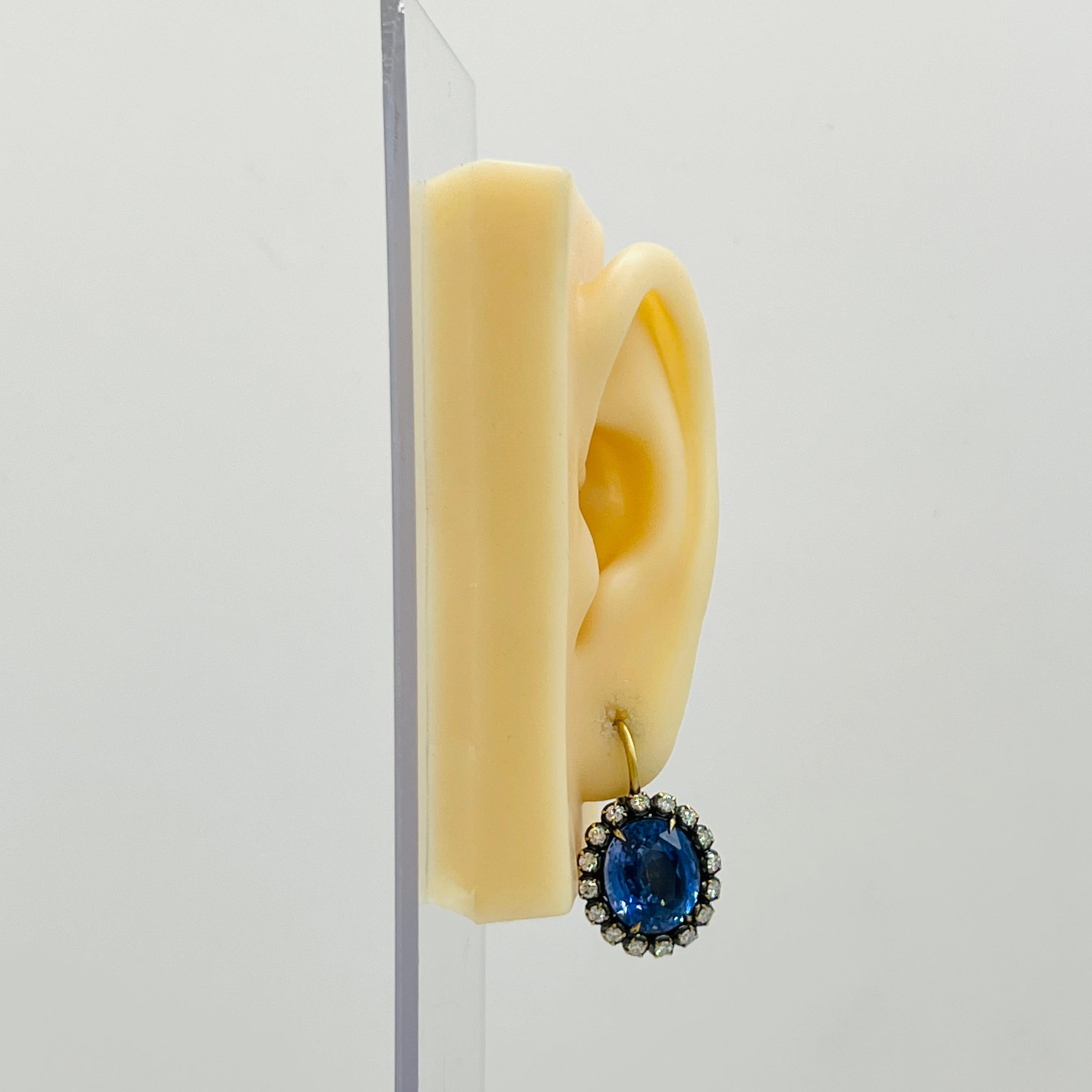 Gorgeous 20.23 ct. unheated blue sapphire ovals with 1.28 ct. good quality white diamond rounds. Handmade in 18k yellow and black rhodium gold. GIA certificate included.