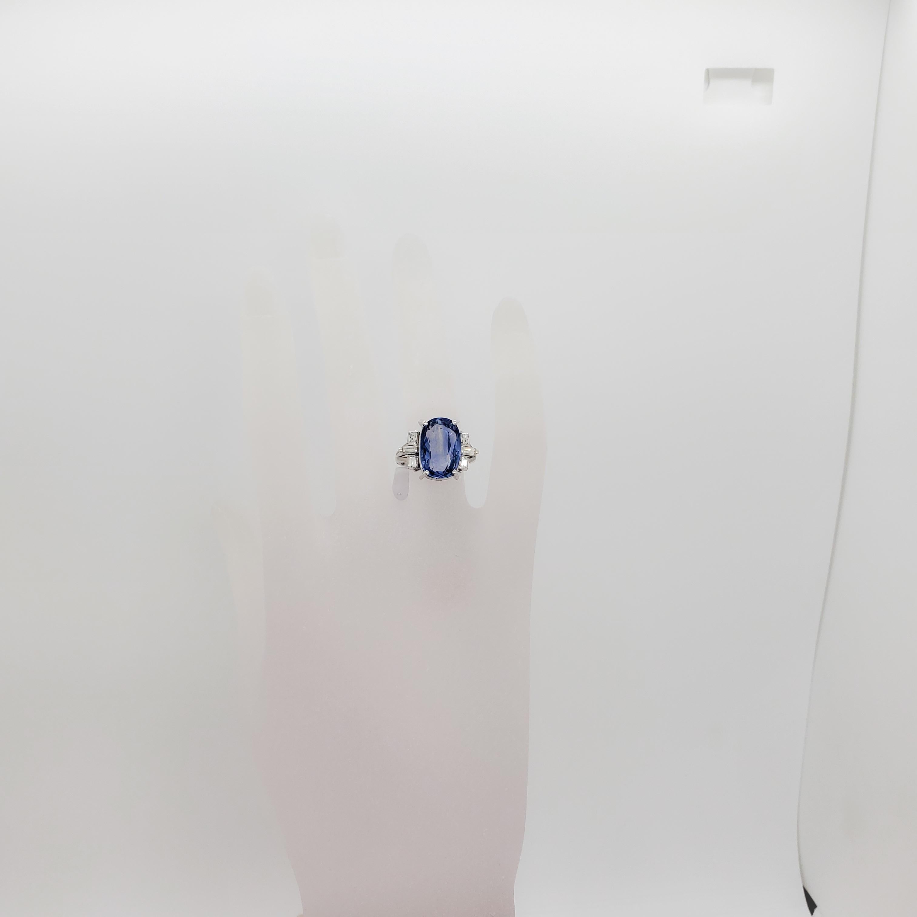 Gorgeous 8.05 ct. Sri Lanka blue Ceylon sapphire oval with 0.52 ct. good quality white diamond emerald cuts in a platinum handmade mounting. Ring size 6.25. Sapphire is unheated. GIA cert.