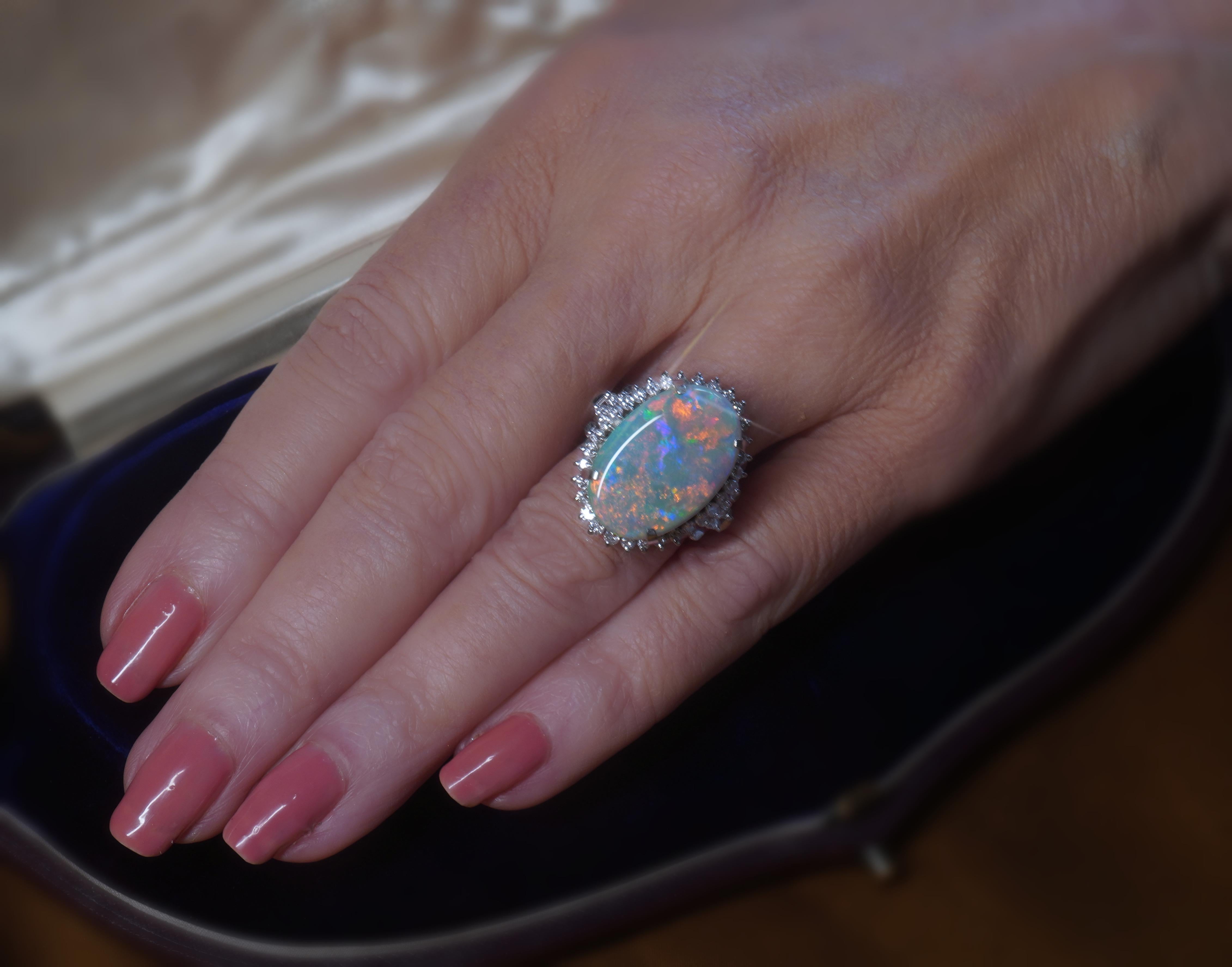 Old South Jewels proudly presents...LUXURY HUGE GIA CERTIFIED SOLID AUSTRALIAN OPAL & DIAMOND VINTAGE PLATINUM RING!   FINE EARTH-MINED HUGE 10.80 CARAT AUSTRALIAN SOLID OPAL, WITH LOTS OF GORGEOUS BRIGHT FIRE.    CROWNED WITH 1.72 CARATS SPARKLING