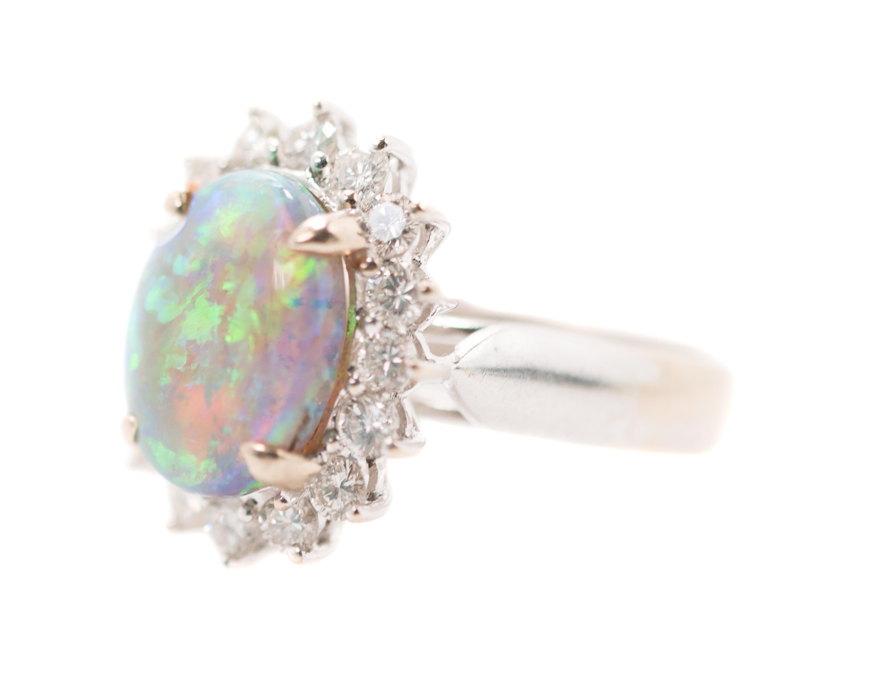 GIA Opal Oval Cabochon and Diamond Halo 18 Karat White Gold Engagement Ring In Excellent Condition In Atlanta, GA