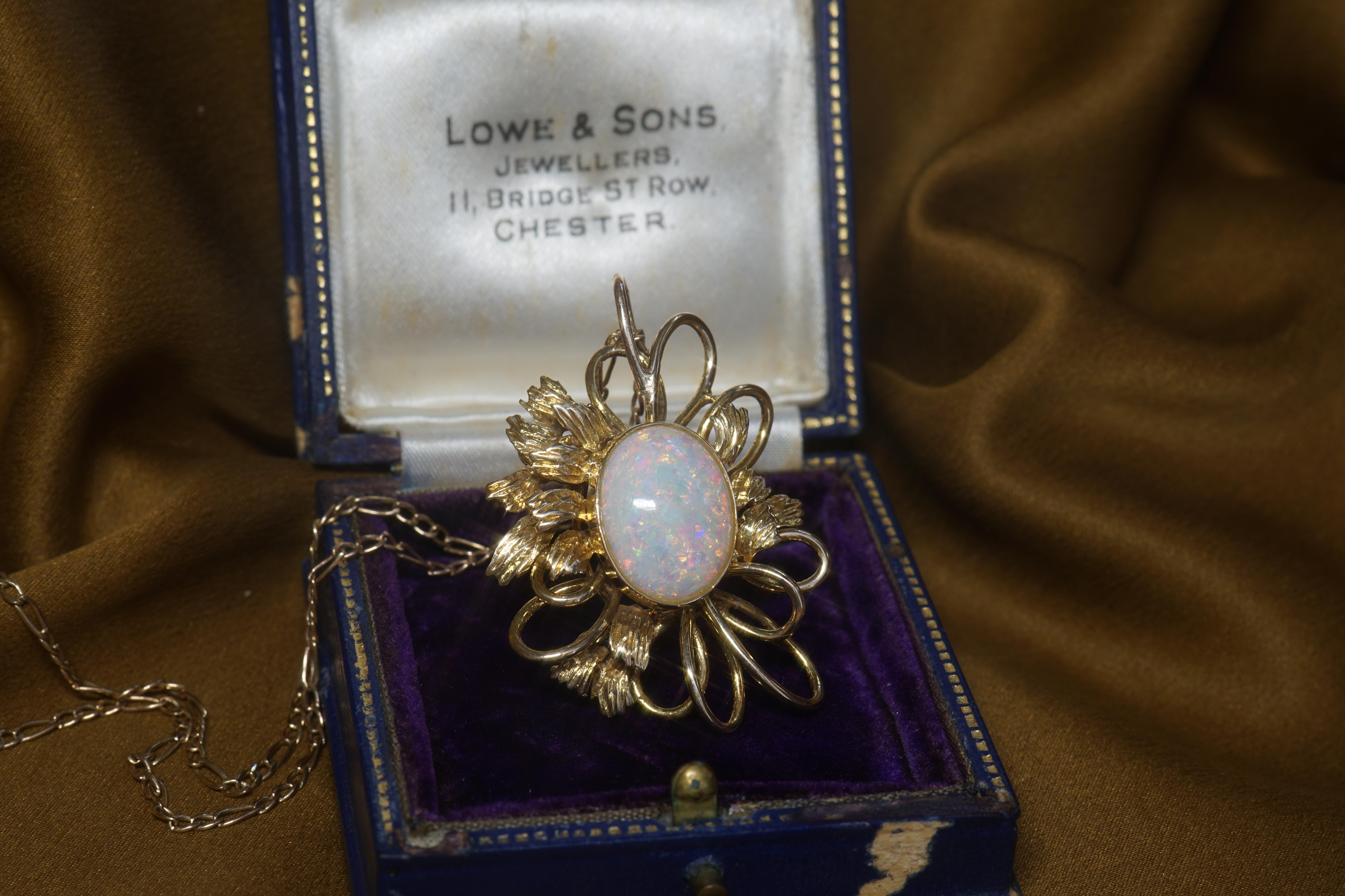 Old South Jewels proudly presents. GIA AUSTRALIAN OPAL VINTAGE 14K SOLID GOLD PENDANT!   BEAUTIFUL 6.64 CARAT SOLID OPAL.   RAINBOX FLASHES OF GREEN, PEACH, BLUE, PINK, AND GOLD.  

Still Beautifully Kept In Vintage Leather Box With Royal Velvet