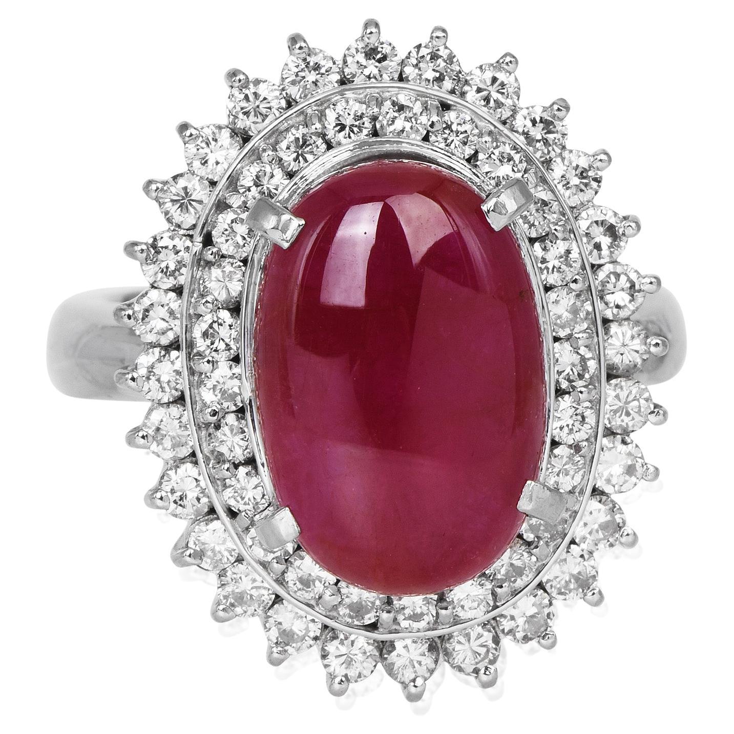 This chic ruby and diamond cocktail ring is crafted in solid platinum, weighing 11.8 grams and 15 mm x 20 mm x 9 mm in height.

Showcasing a prominent GIA lab reported oval-shaped, prong-set purplish pinkish red ruby, weighing approximately, 2.29