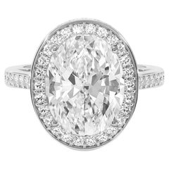 GIA Certified 5.03 Oval Cut Diamond Ring with Halo F Color VVS2 Clarity