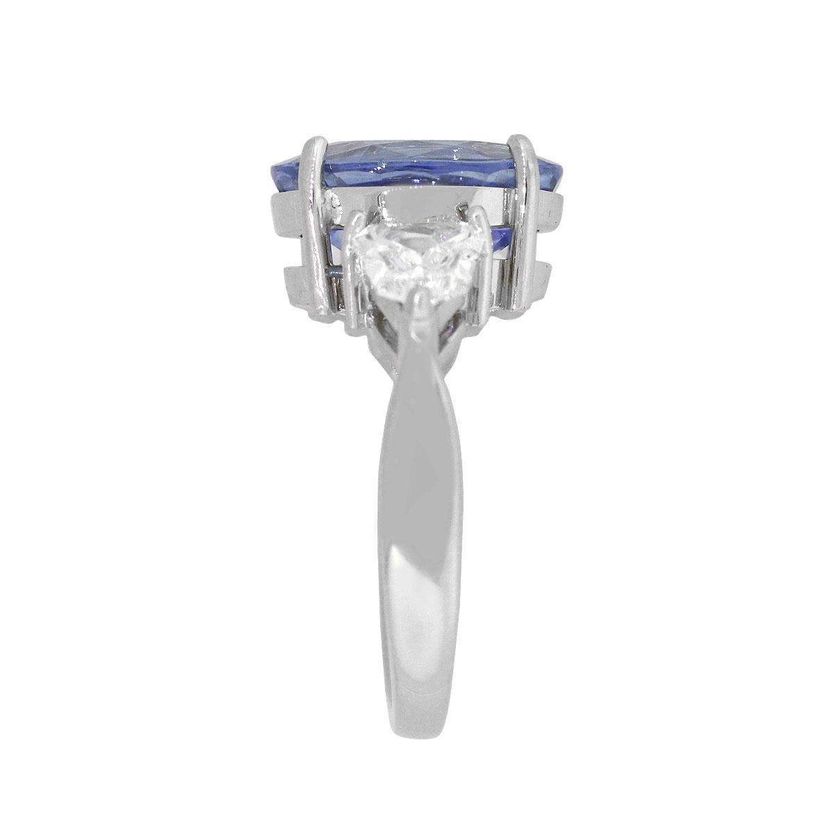 Material: 14k White Gold
Sapphire Details: Approx. 6.13ct Oval cut sapphire. GIA # 2205332124
Adjacent Diamond Details: Approx. 1ctw kite cut diamonds. Diamonds are G/H in color and VS in clarity
Ring Size: 6.75
Total Weight: 6.8g(4.3dwt)
Ring