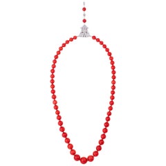 GIA Oxblood Coral Strand and 3.95 Carat Diamond and Platinum Clasp