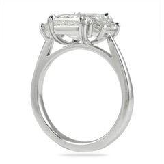 GIA Certified 3.00 Carat Emerald Cut Diamond VVS1 Clarity with trapezoid diamond
