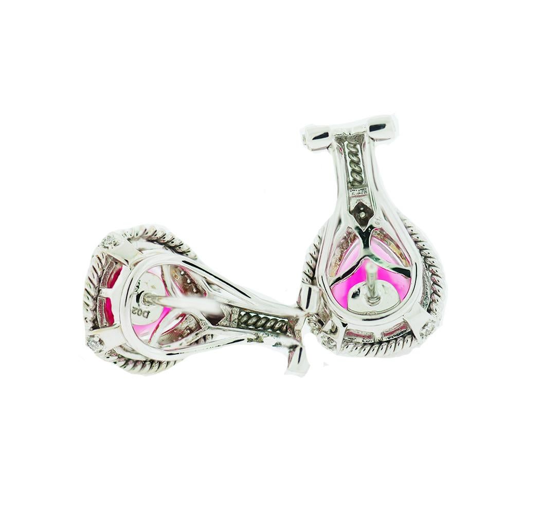 GIA Pink Tourmaline Diamond Earrings 4.21 Carats
Gorgeous purplish Red colored, pear shaped Tourmaline are measuring 9.30 x 7.52 mm and have a total weight of 4.21 carats.  These pink stones are call Rubellite Tourmaline. One stone weight is 2.13