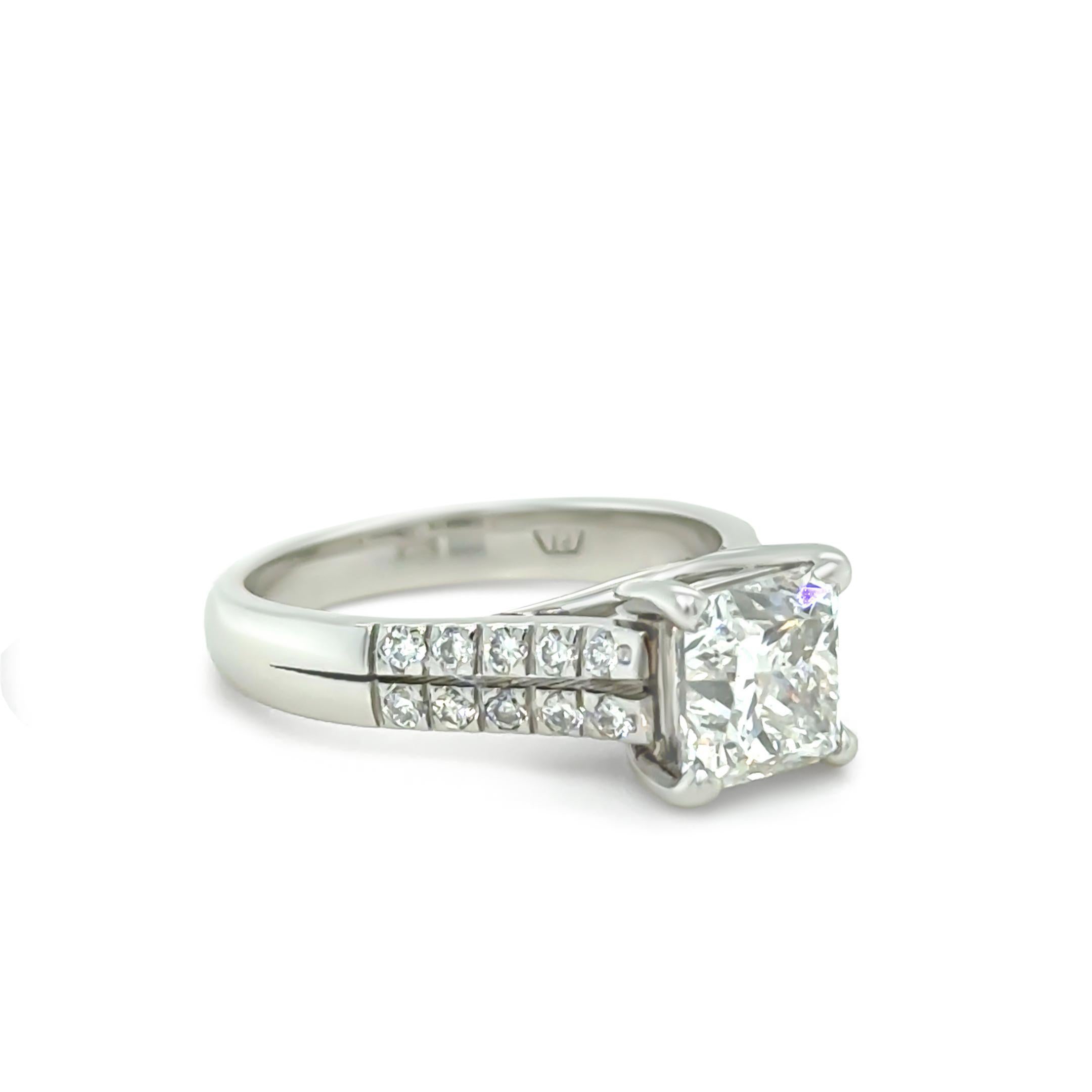 
This stunning GIA Platinum engagement ring is crafted from 950 Platinum. At its heart sits a magnificent 2.01-carat princess-cut diamond with G colour and VS2 clarity, certified by GIA (Report #1126662047).

Complementing the centrepiece are 20