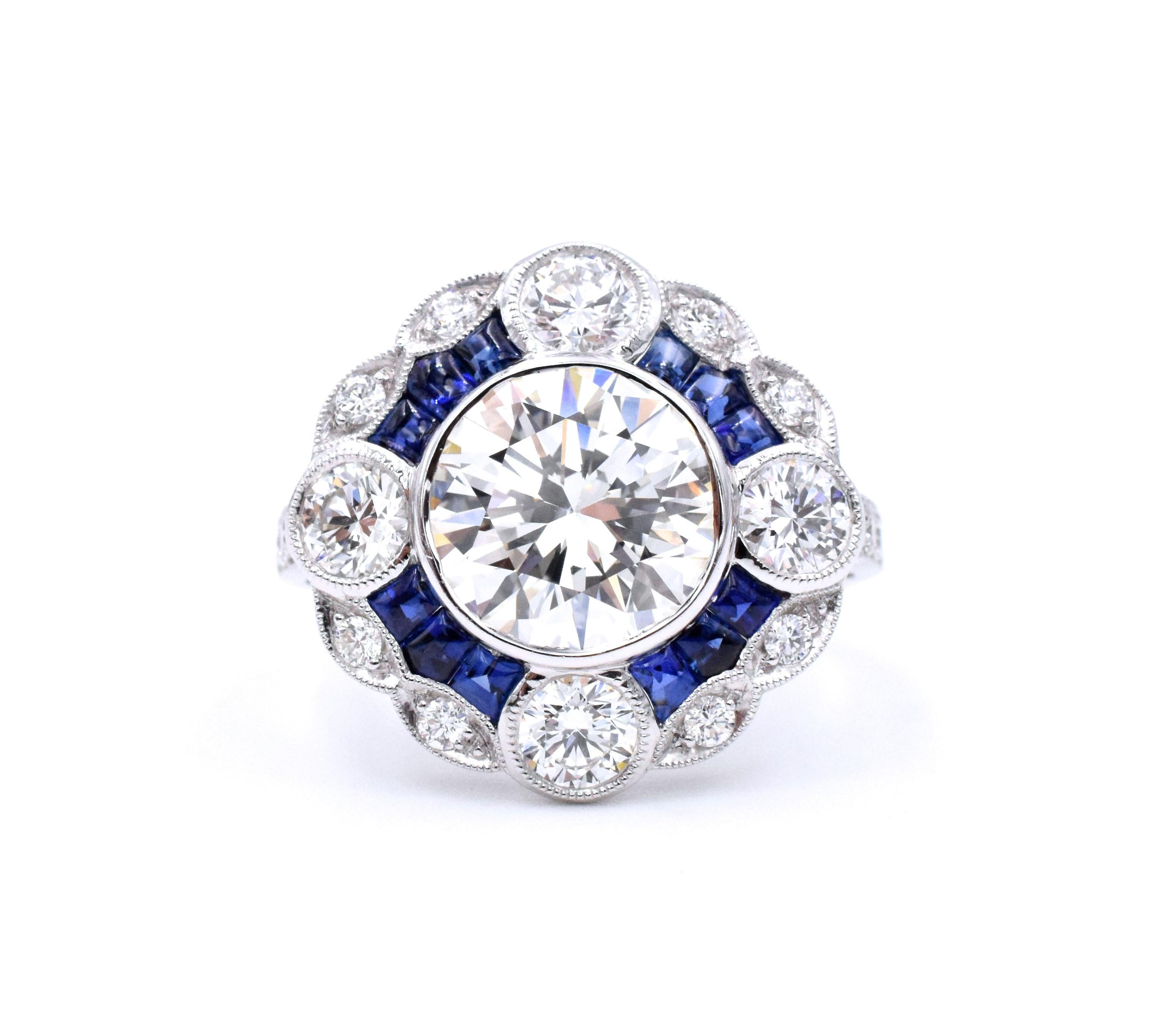 Platinum diamonds and sapphire ring , set with 18 round brilliant cut diamonds. Total
weight: approx. 1.26 carat and 12 cabochon sapphires total weight approx. 1.80ct. In the center: 3.03 carat round brilliant cut diamond, color: K, clarity: VS1,