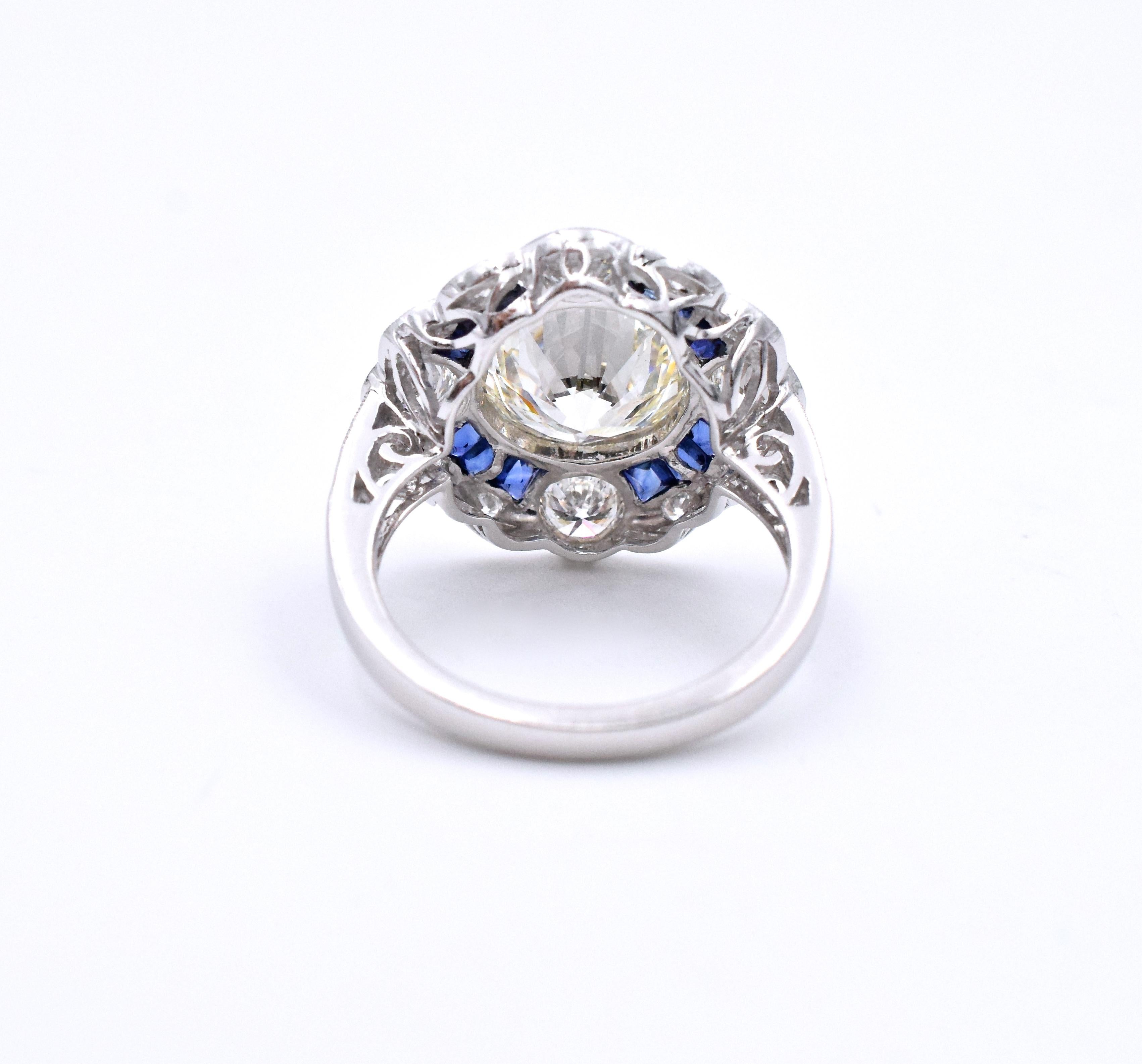 Round Cut GIA Platinum Diamonds and Sapphire Ring For Sale