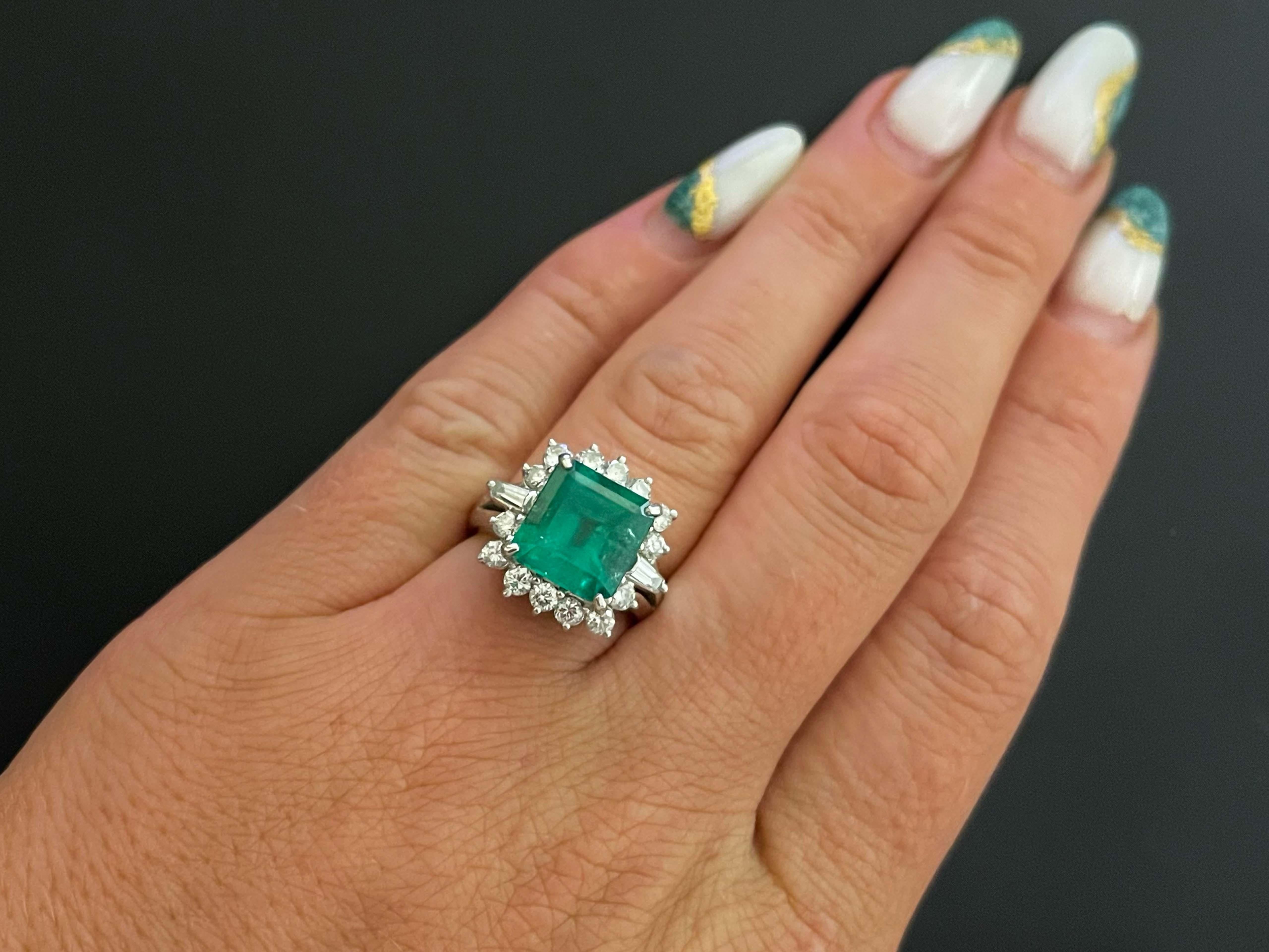 Rare 4.24 ct. Fine Colombian Emerald & Diamond Platinum Ring With GIA Report. This stunning ring features a 4.24 octagonal, step cut, semi-transparent Emerald, surrounded by a gorgeous 16 diamond halo. The Colombian Emerald is accompanied by a GIA