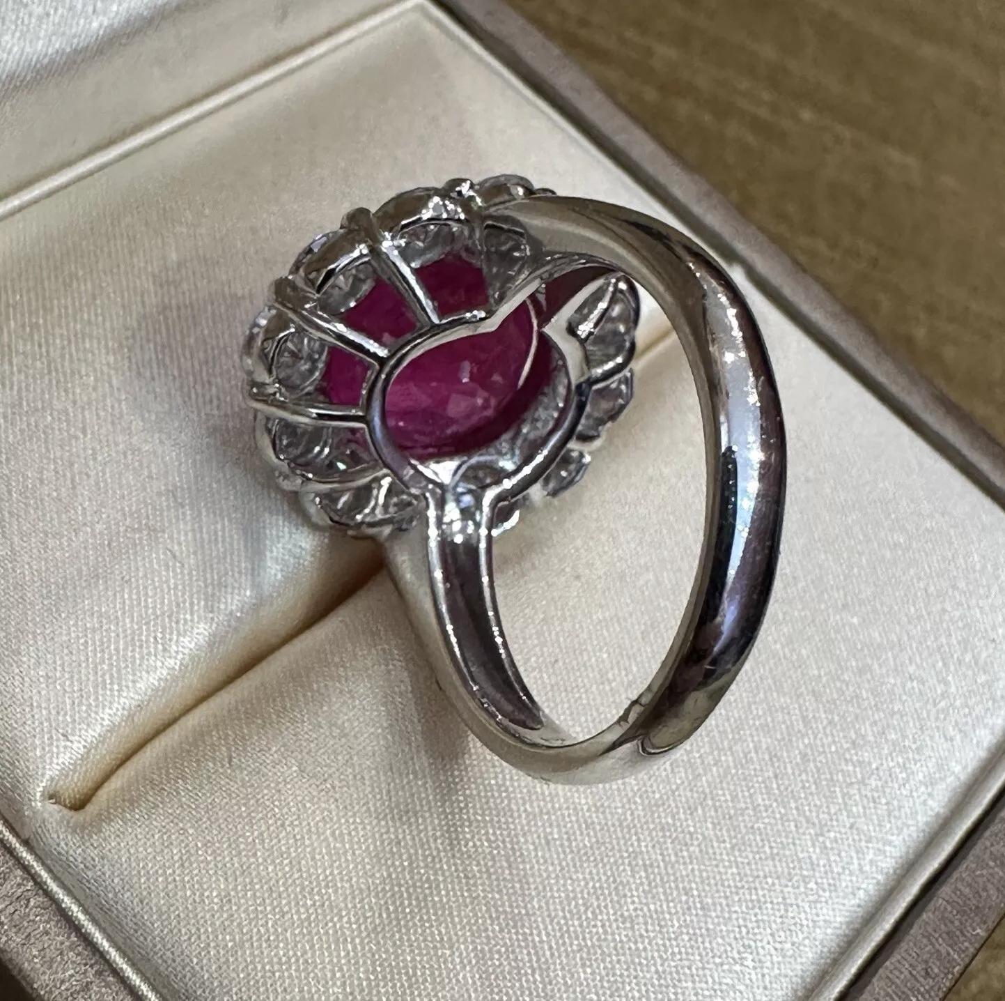 Women's GIA Red Natural Oval Ruby 8.88 carat and Diamond Ring in Platinum For Sale