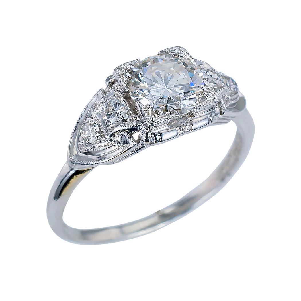 GIA report certified 0.83 carat F color round brilliant cut diamond solitaire engagement ring in a platinum mounting circa 1930 ring size 6 ¼.  This is a fine diamond engagement ring with which you can impress that special lady in your life by