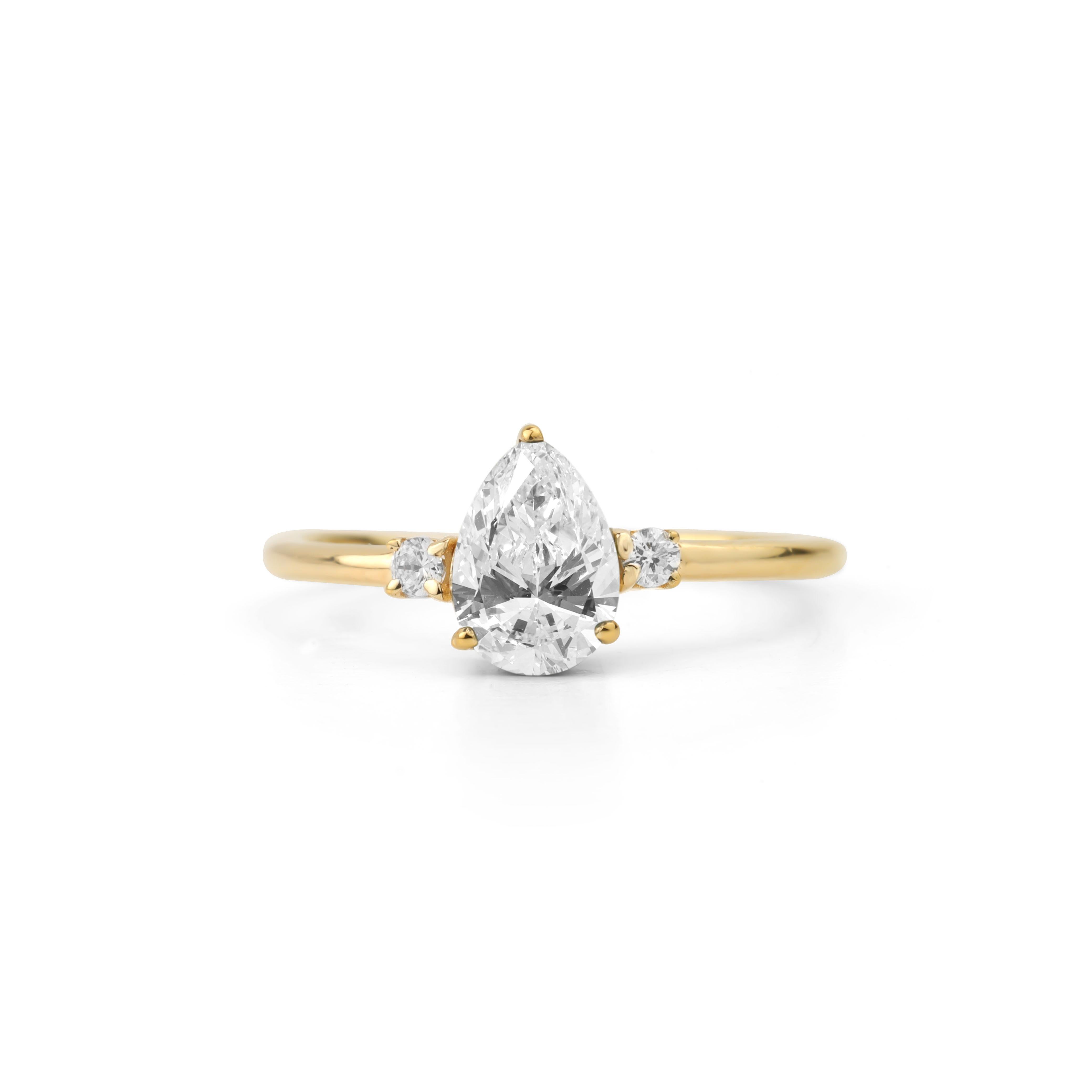 GIA Report Certified 1 Carat E VS Pear Cut Diamond 18k Halo Engagement Ring

This timeless piece exudes sophistication and romance, making it the perfect symbol of your love and commitment. With its GIA certification guaranteeing quality and