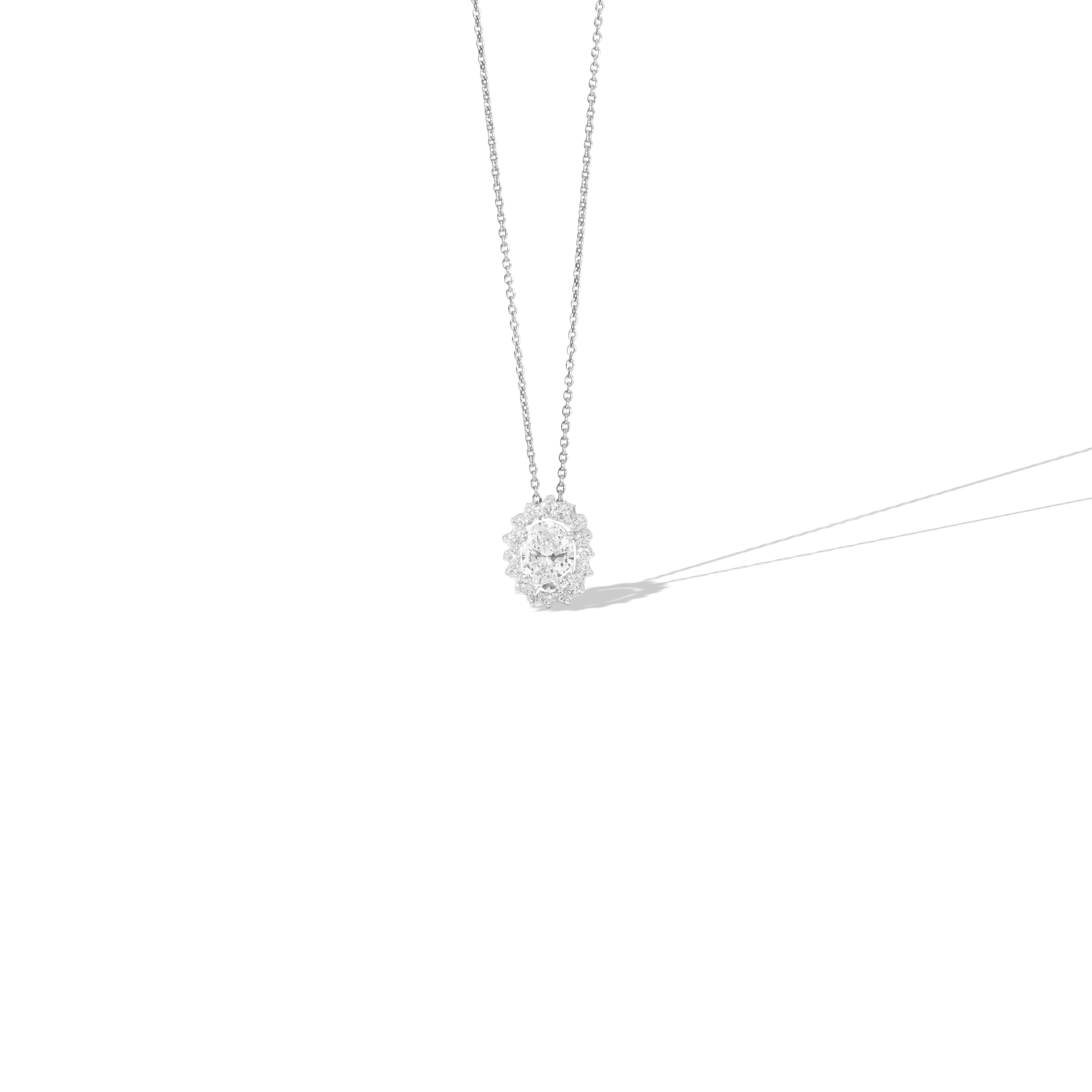 GIA Report Certified 1 Carat Oval Cut E VVS Diamond Halo Pendant Necklace

Available in 18k White gold.

Same design can be made also with other custom gemstones per request.

Product details:

- Solid gold

- Main stone - 1 carat GIA certified E