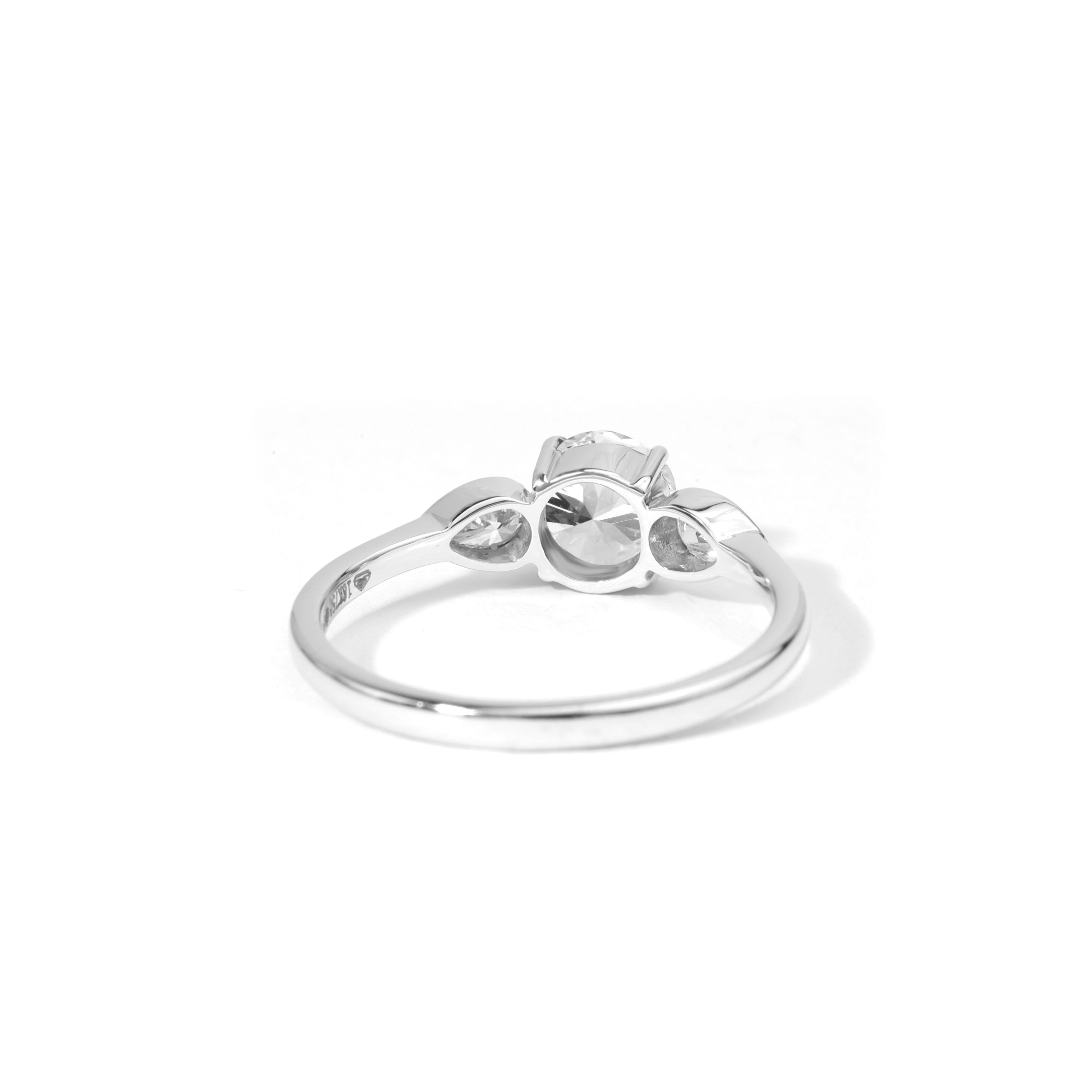 GIA Report Certified 1 Carat Round Cut Three Stone Diamond Ring 18k White Gold

Available in 18k white gold.

Same design can be made also with other custom gemstones per request.

Product details:

- Solid gold

- 1 carat E color and VVS purity GIA