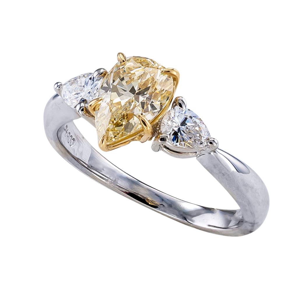 GIA report certified 1.00 carat fancy light yellow pear shaped diamond engagement ring.  It is time to pop the question and present that special lady in your life with this most impressive GIA certified fancy light yellow, pear-shaped, one-carat