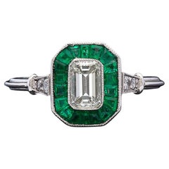Anello di fidanzamento Art Deco con diamante naturale certificato e smeraldo in oro 18 carati