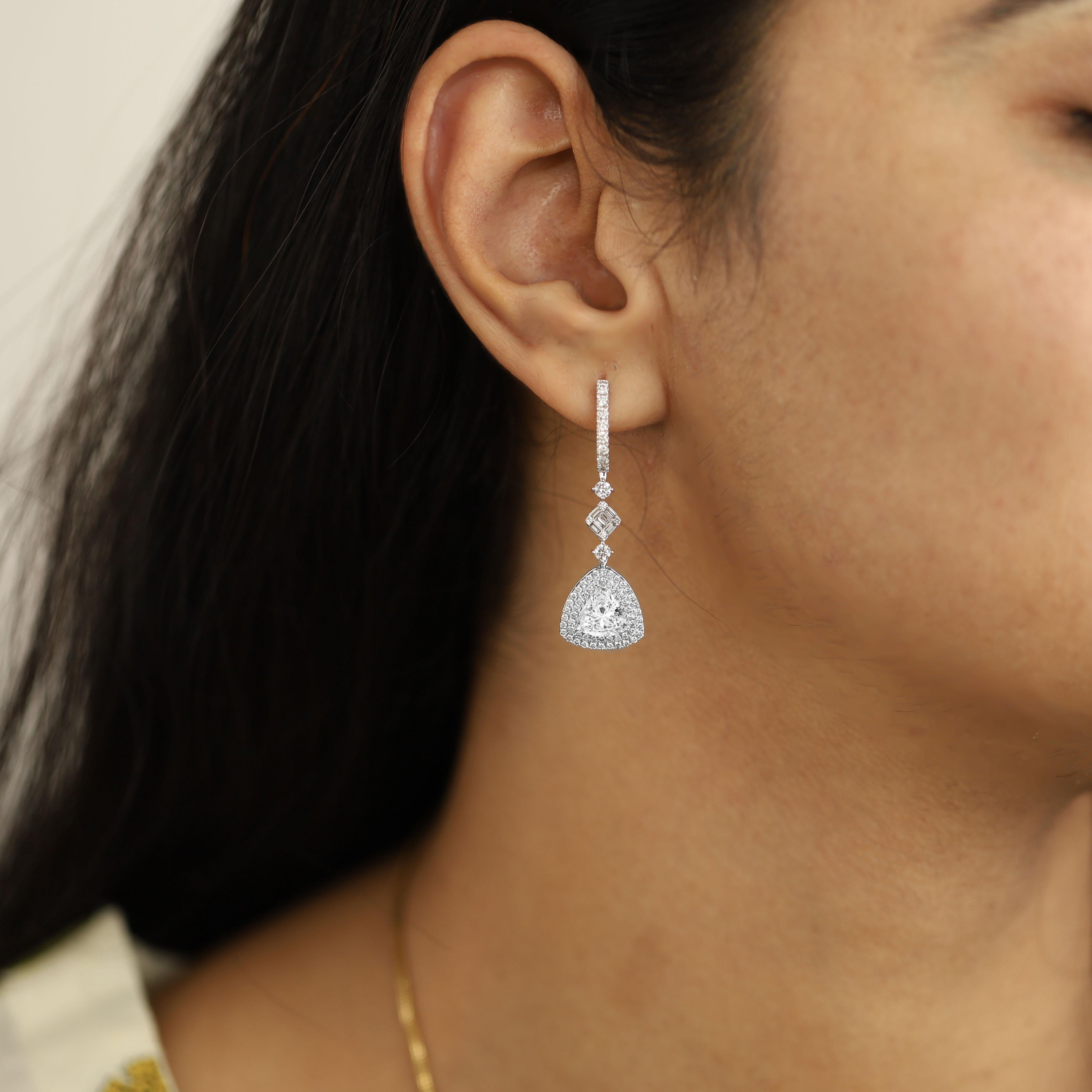 GIA Report Certified 1.5 Carats E VVS Diamond Trillion Cut Drop Dangle Earrings 

Available in 18k white gold.

Same design can be made also with other custom gemstones per request.

Product details:

- Solid gold (approx. 8 grams)

- GIA 1.5 carat