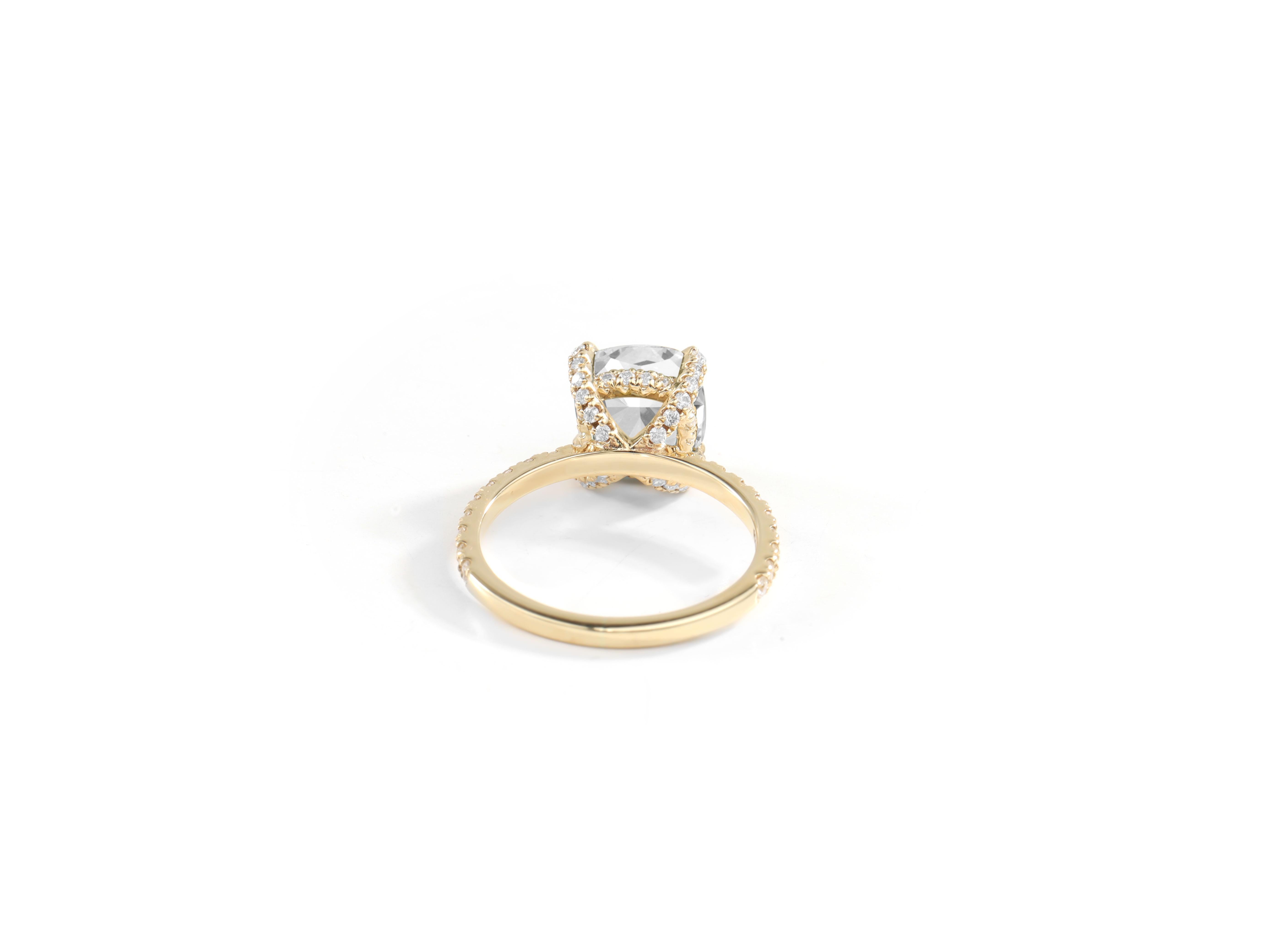GIA Report Certified 2 Carat E VVS Cushion Cut Diamond 18k Hidden Halo Engagement Ring in Yellow Gold

This stunning GIA certified engagement ring features a 2-carat cushion-cut diamond of exceptional E color and VVS clarity, ensuring breathtaking
