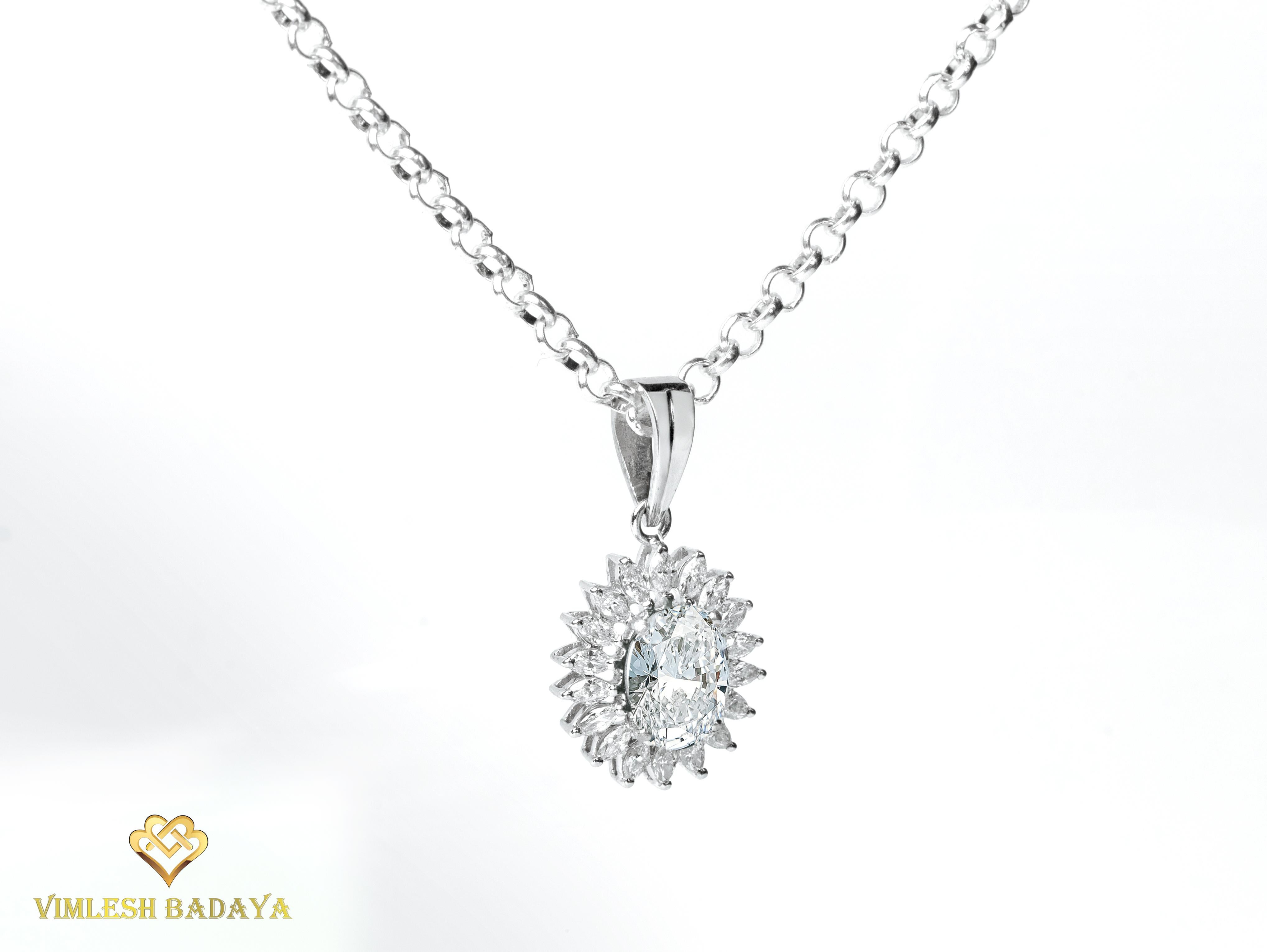 GIA Report Certified 2 Carat H Colorless VS Oval Cut Diamond Halo Pendant

Available in 18k White gold.

Same design can be made also with other custom gemstones per request.

Product details:

- Solid gold

- Main stone - approx. 2 carat GIA