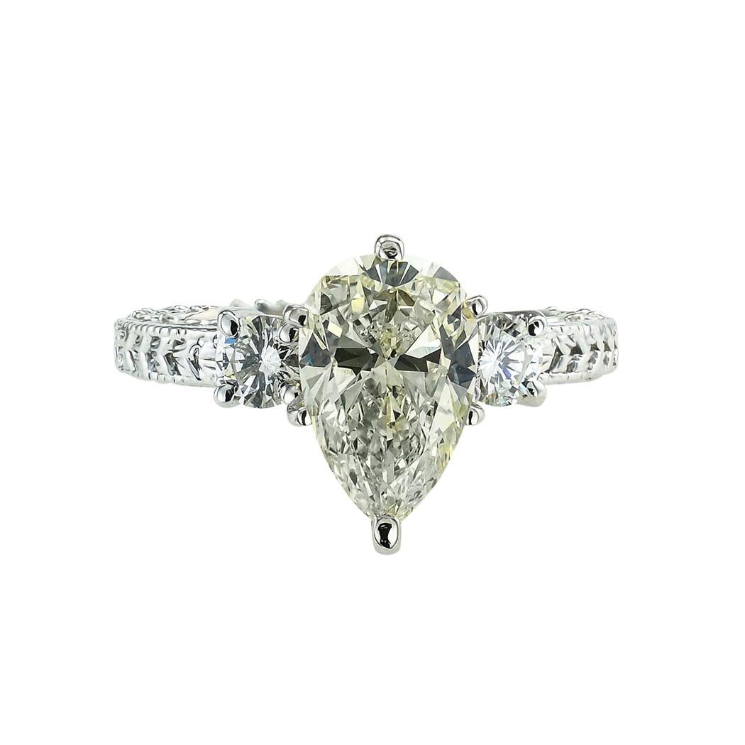 GIA report certified 2.20 carats pear-shaped diamond and white gold solitaire engagement ring.  *

ABOUT THIS ITEM:  #R-DJ1228C. Scroll down for specifications.  The contemporary design prominently showcases a bright 2.20 carats pear-shaped diamond