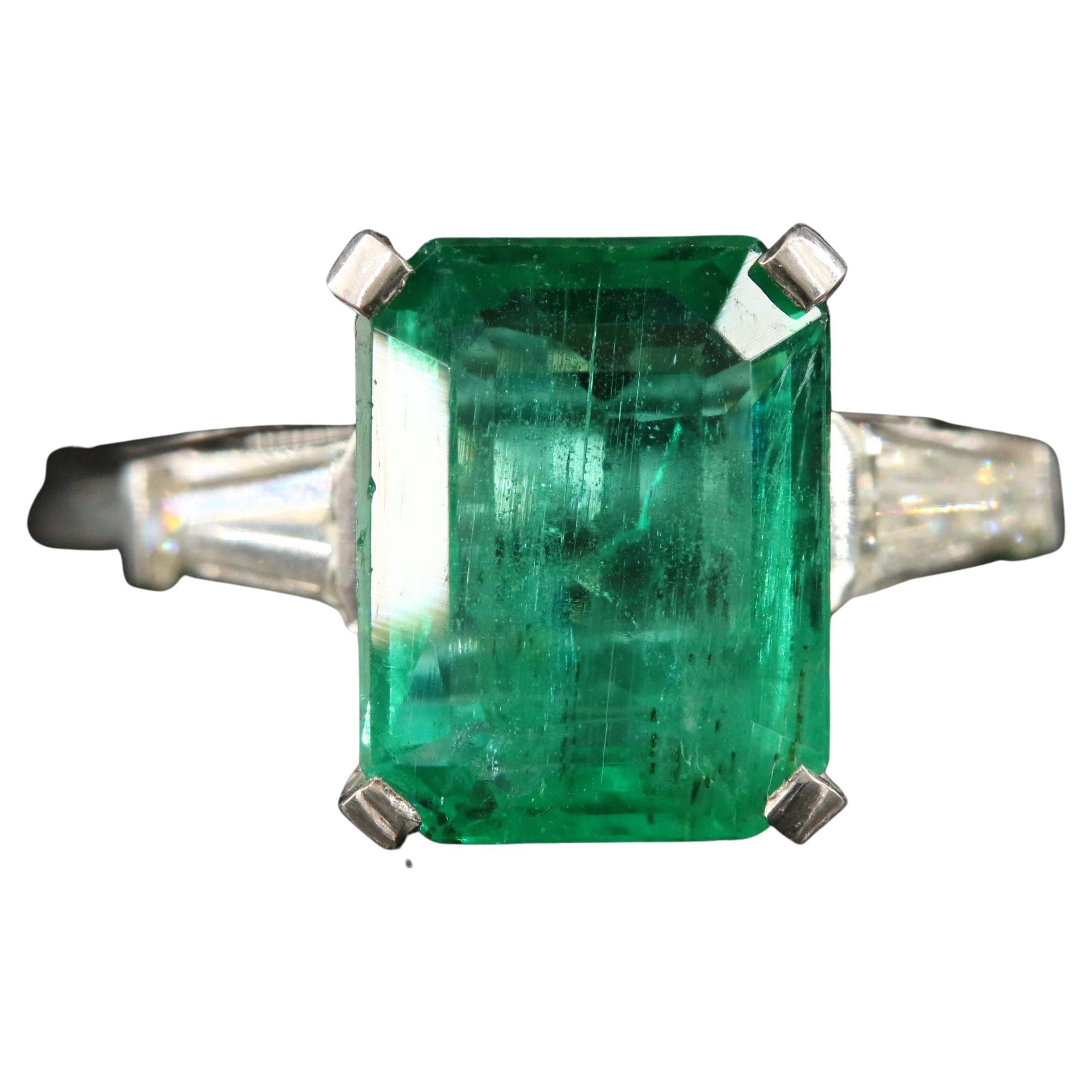24.66 Carat Zambian Emerald Surrounded by Baguettes Cocktail Wedding Party Ring 