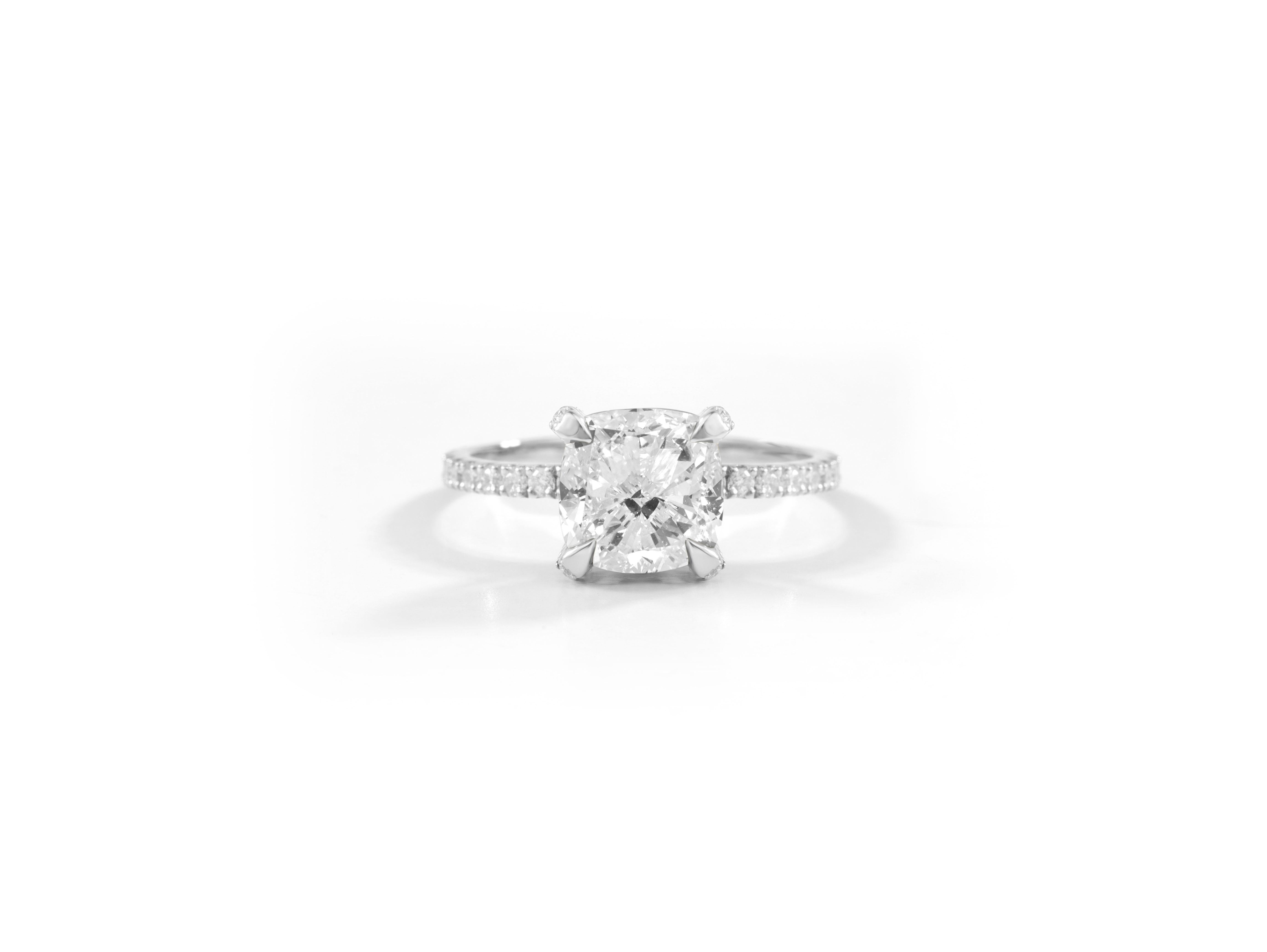 GIA Report Certified 2.5 Carat F VS Cushion Cut Diamond 18k Hidden Halo Engagement Ring

This stunning GIA certified engagement ring features a 2.5-carat cushion-cut diamond of exceptional F color and VS clarity, ensuring breathtaking brilliance and