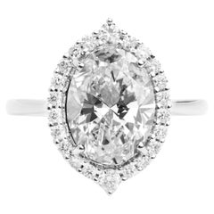 GIA Report Certified 3.5 Carat E VS Oval Cut Diamond 18k Halo Engagement Ring
