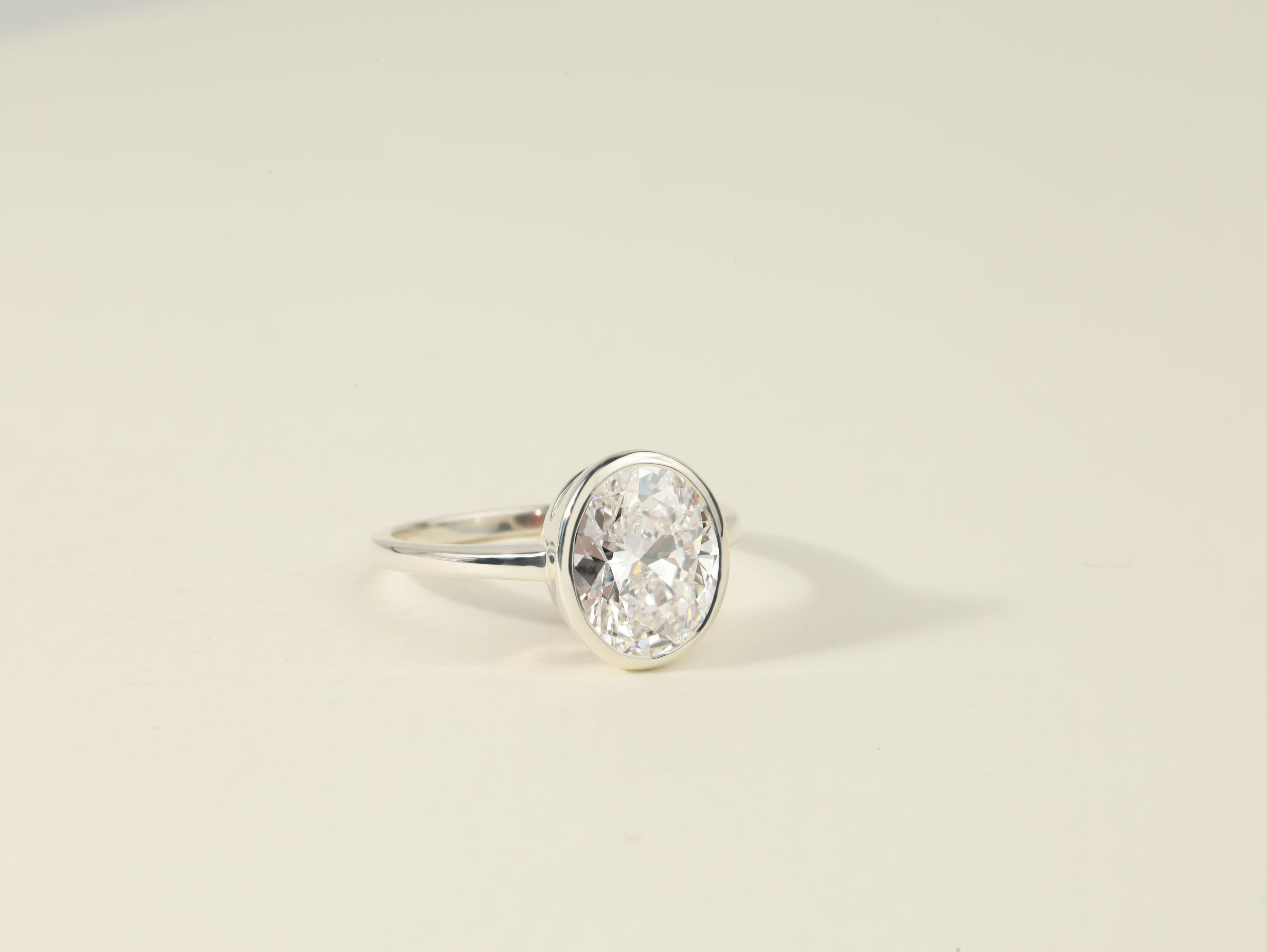 Art Deco GIA Certified 3.5ct Oval-Cut Solitaire Diamond Ring in 18K White Gold  Signature For Sale