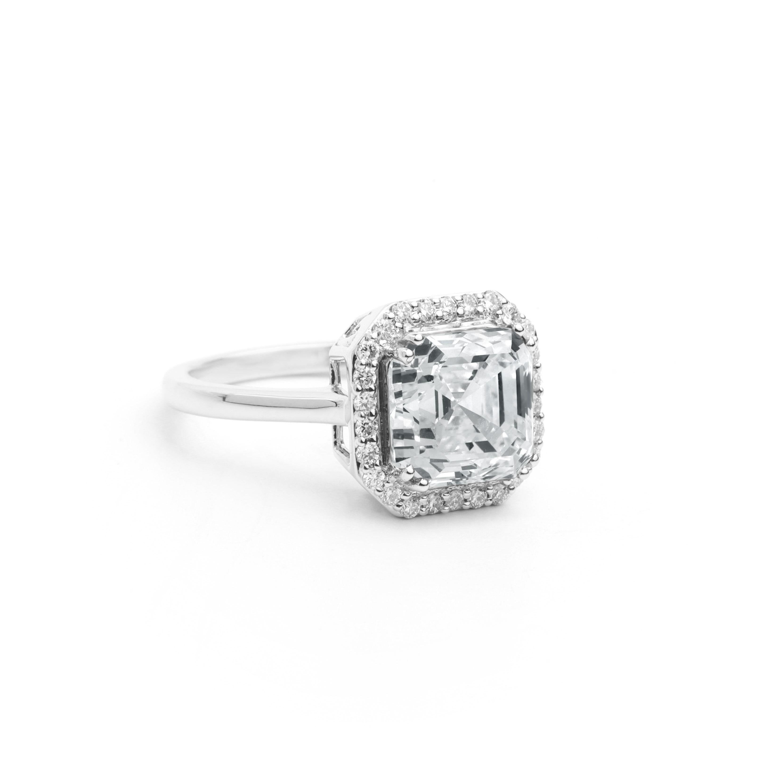 GIA Report Certified 4 Carat H VS Asscher Cut Diamond 18k Halo Engagement Ring

Embrace timeless elegance with this exquisite GIA Report Certified Asscher Cut Diamond Engagement Ring. Featuring a stunning 4-carat H color, VS clarity Asscher cut